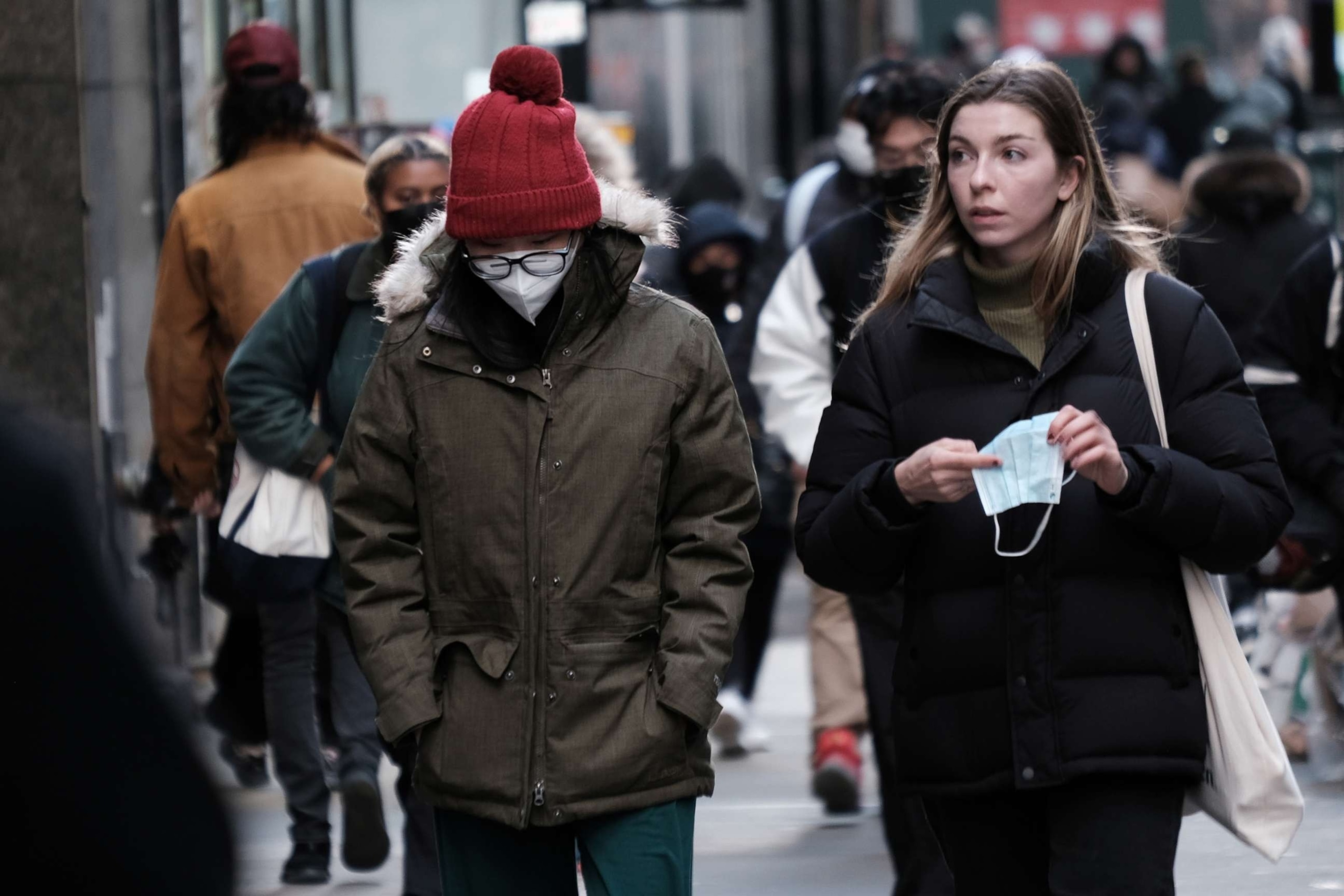PHOTO: People wear face masks in Manhattan on Nov. 29, 2021 in New York City.