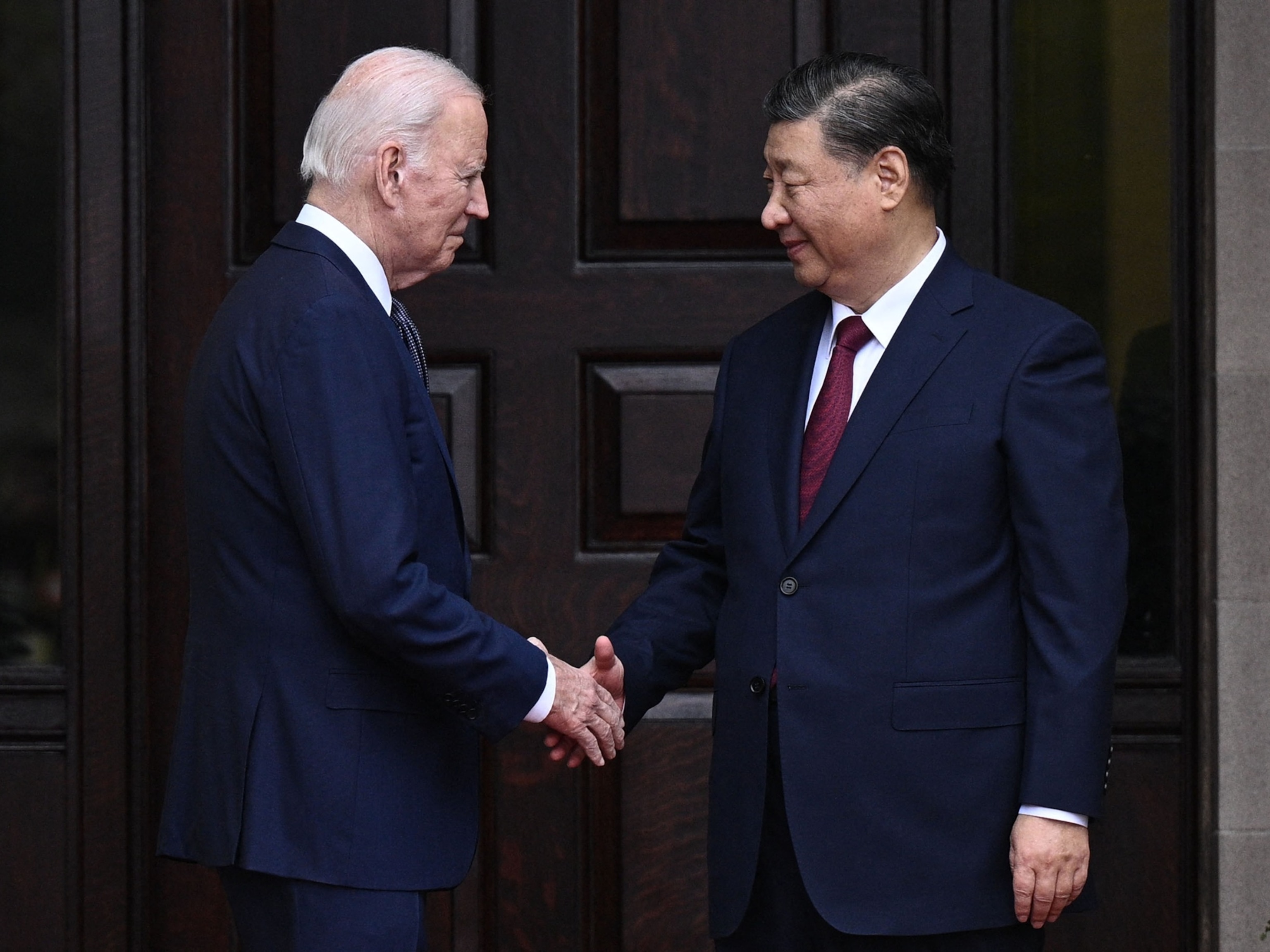 PHOTO: U.S. President Joe Biden greets Chinese President Xi Jinping before a meeting during the Asia-Pacific Economic Cooperation (APEC) Leaders' week. Nov. 15, 2023, in Woodside, Calif.