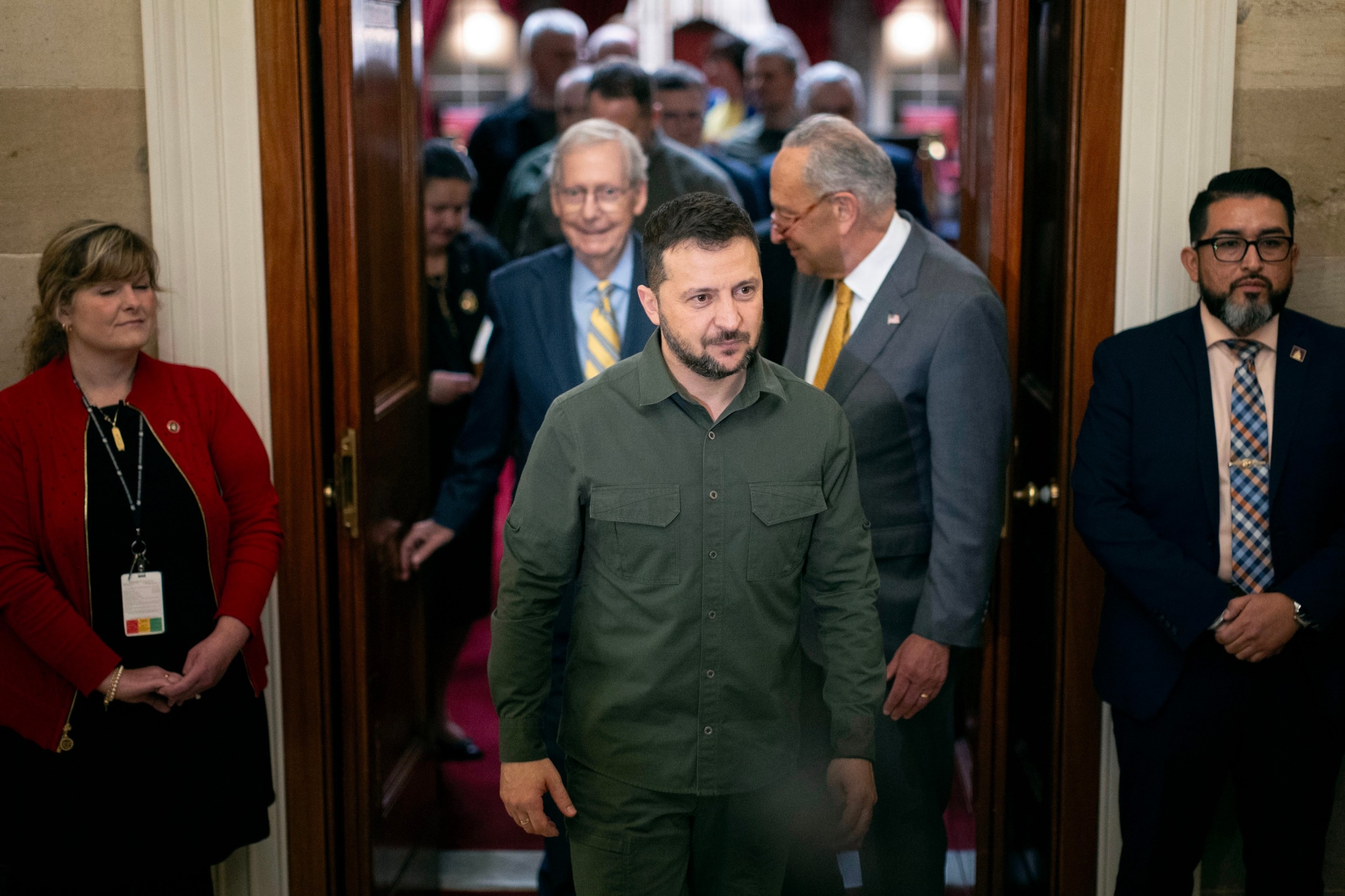 PHOTO: Ukrainian President Volodymyr Zelenskyy exits the Old Senate Chamber following a closed-door meeting, alongside Senate Minority Leader Mitch McConnell and Senate Majority Leader Chuck Schumer at the U.S. Capitol, September 21, 2023.