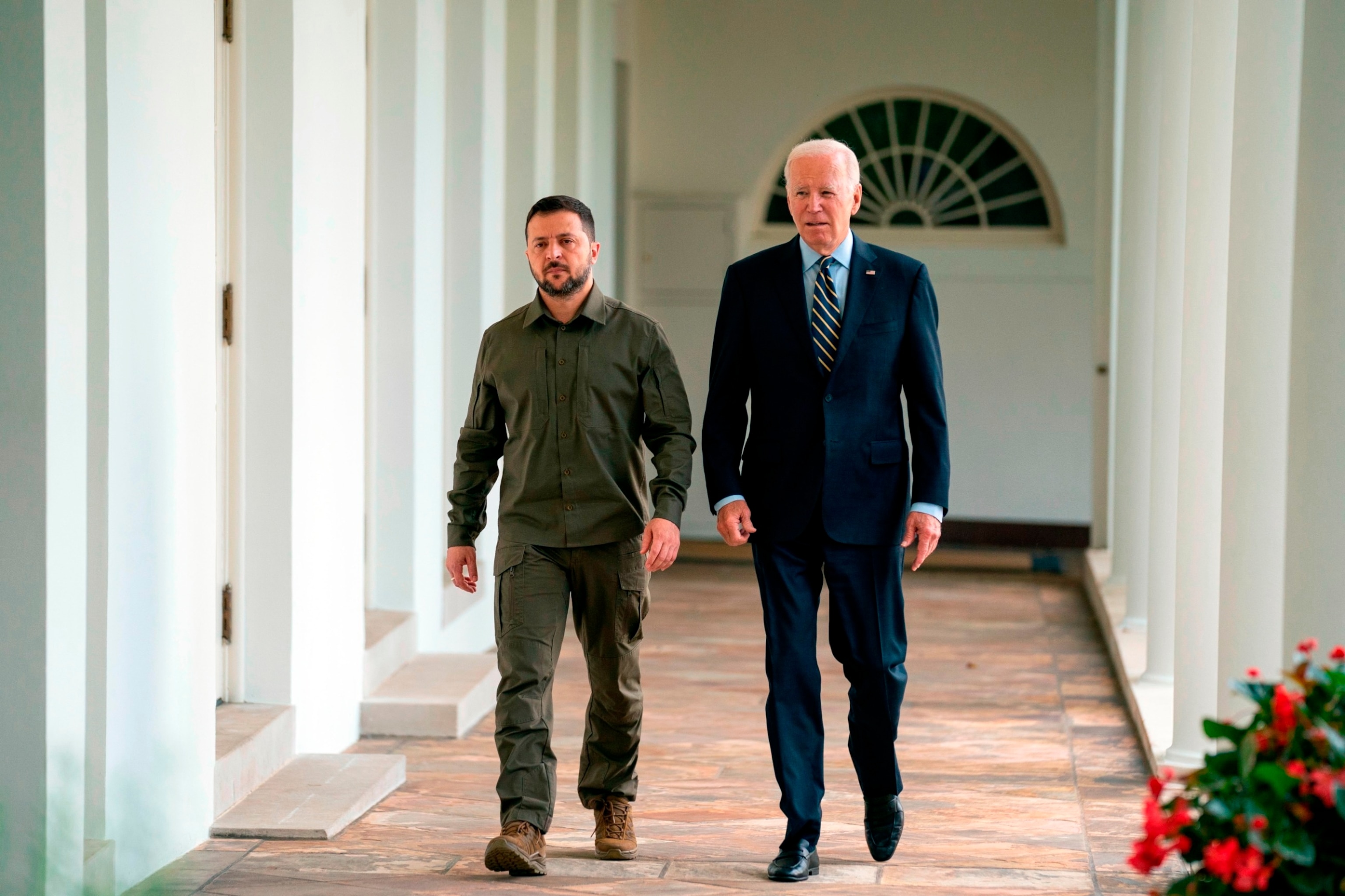 PHOTO: Ukrainian President Volodymyr Zelensky (L) walks with U.S. President Joe Biden down the colonnade to the Oval Office during a visit to the White House September 21, 2023 in Washington, DC.