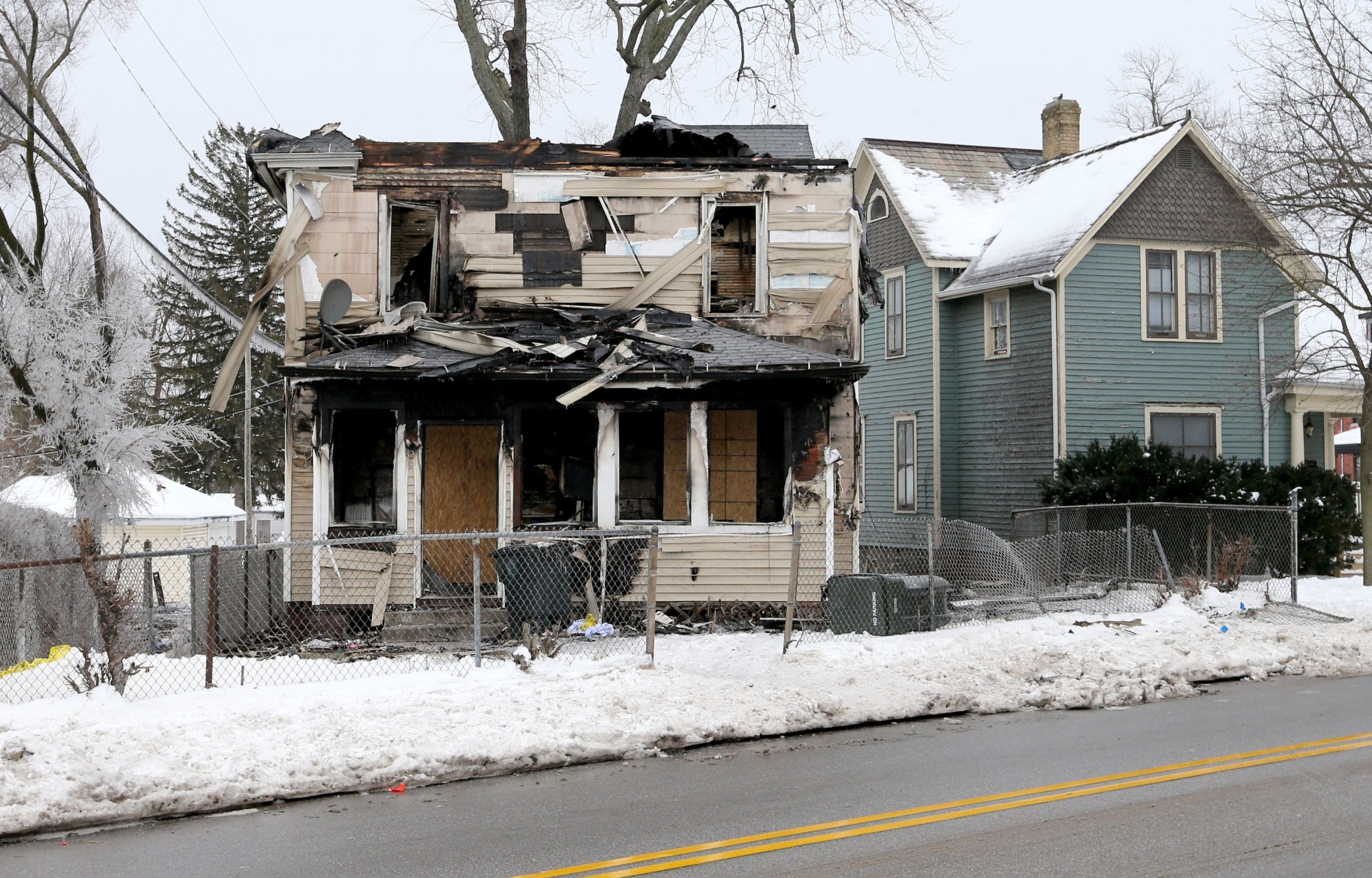 PHOTO: The burned-out shell of a two-story house where five children died in a blaze, South Bend, IN, Jan. 22, 2024.