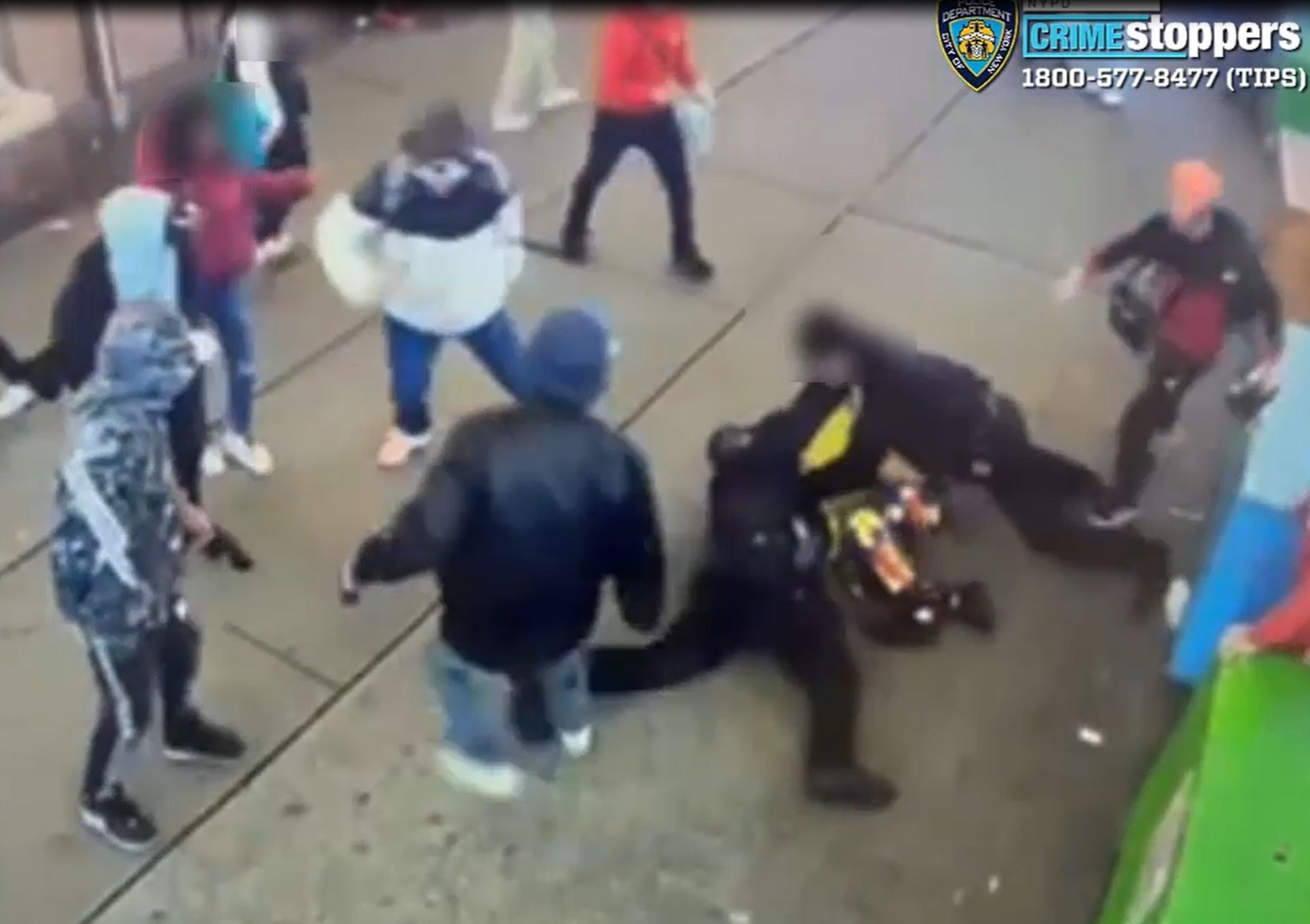 PHOTO: 5 asylum-seekers are pictured in an encounter with police officers in Times Square on Jan. 27, 2024.