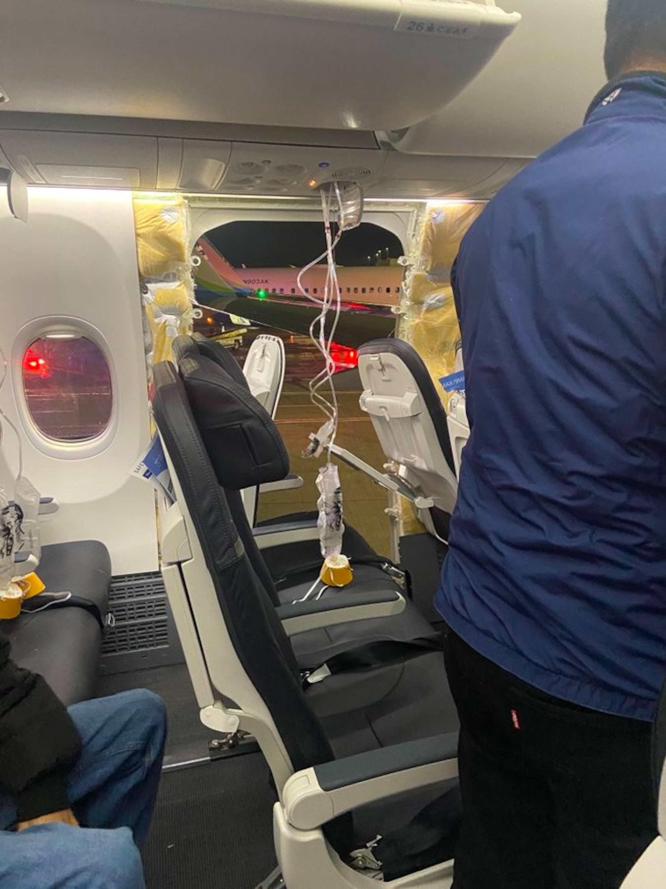 PHOTO: A photo of damage to a Boeing airplane taken by Kyle Rinker, a passenger on Alaska Airlines Flight 1282, which made an emergency landing in Portland, Oregon, on Friday, Jan. 5, 2024. 