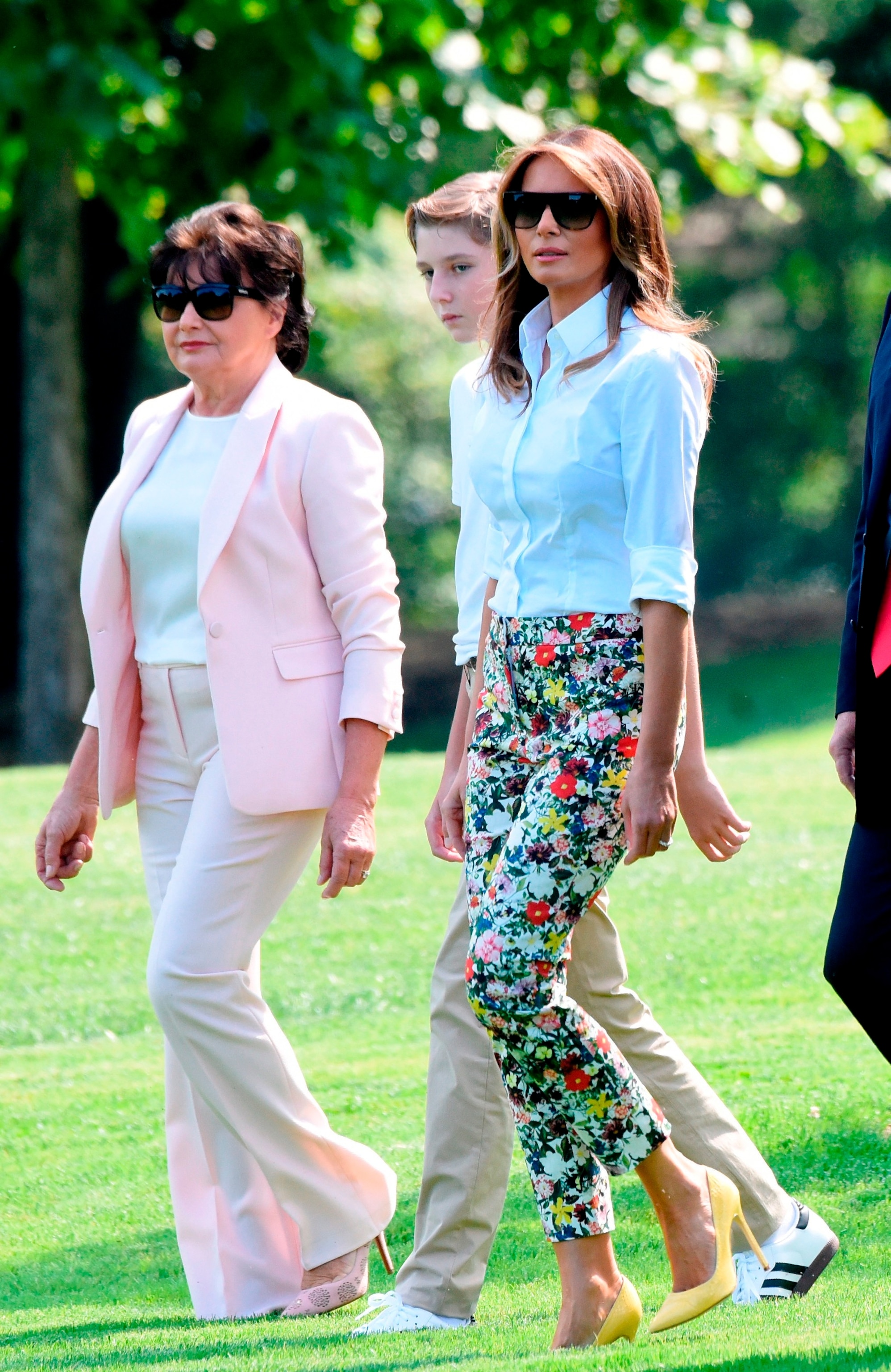 PHOTO: Barron Trump, former First Lady Melania Trump and her mother Amalija Knavs depart the White House en route to Joint Base Andrews, in Washington, D.C., on June 29, 2018. 