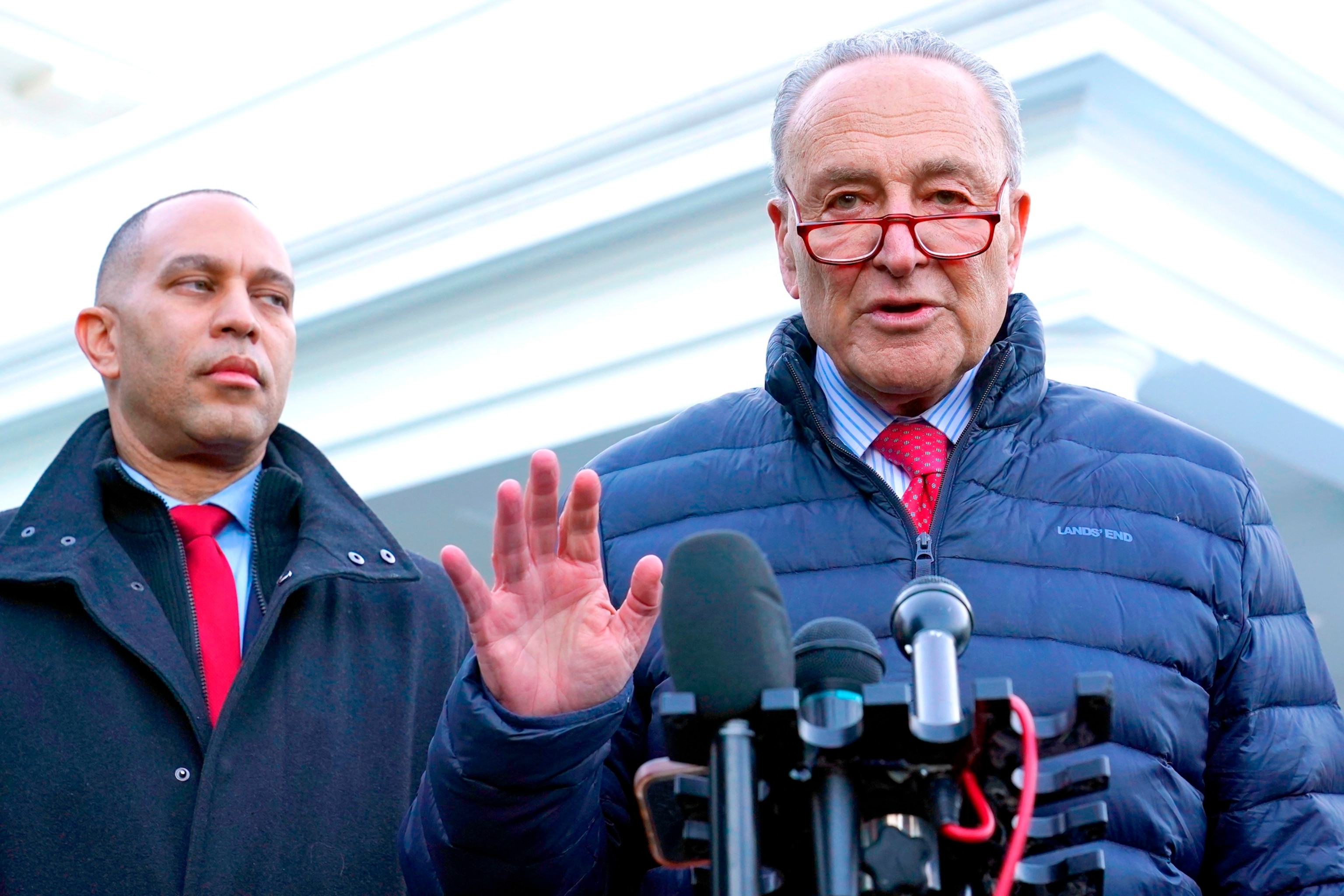 PHOTO: Senate Majority Leader Chuck Schumer, standing next to House Minority Leader Hakeem Jeffries talks to reporters outside the West Wing of the White House in Washington, Jan. 17, 2024, following a meeting with President Joe Biden. 