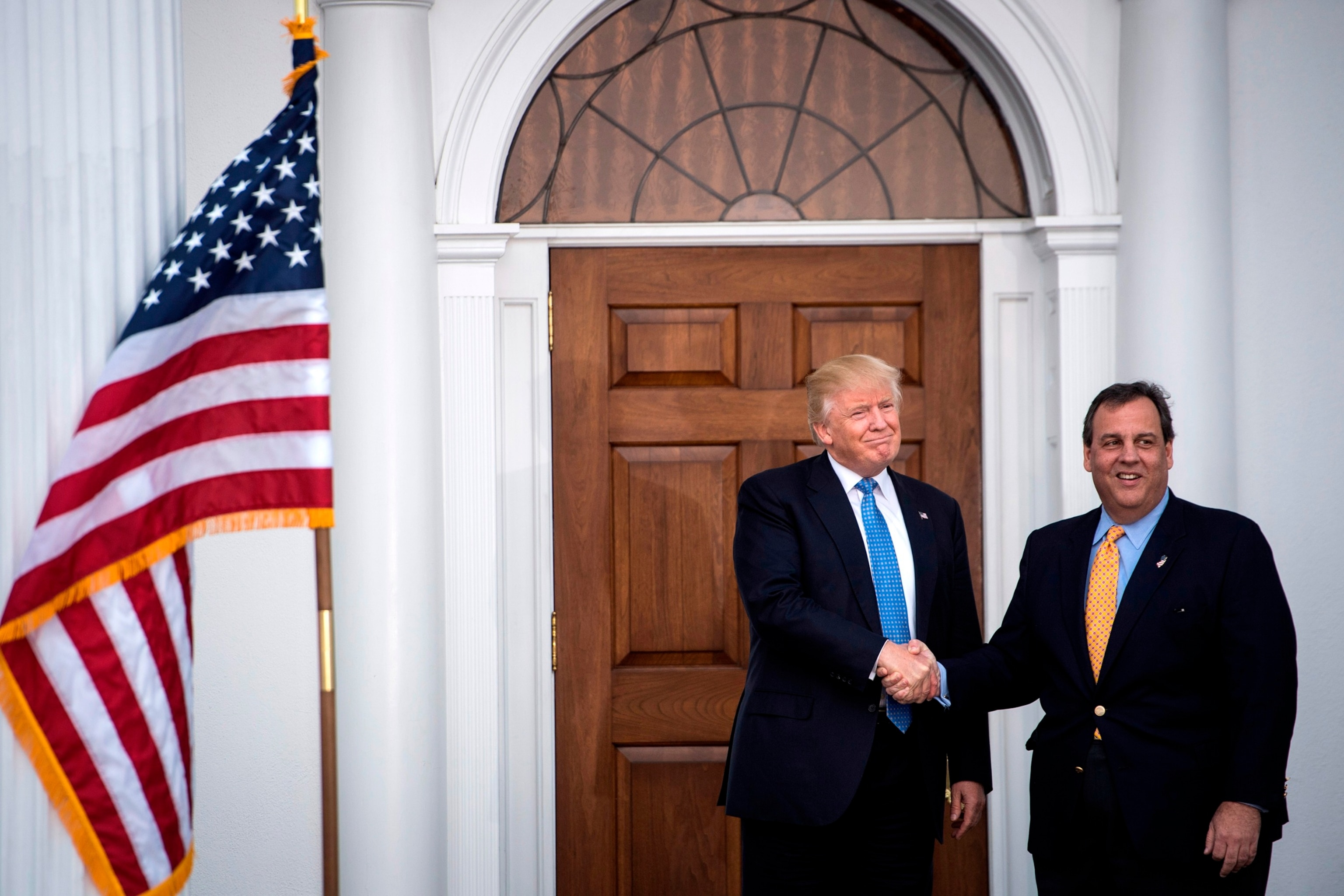 PHOTO: In this Nov. 20, 2016, file photo, President-elect Donald Trump greets New Jersey Gov. Chris Christie at the clubhouse at Trump National Golf Club Bedminster, in Bedminster Township, N.J.