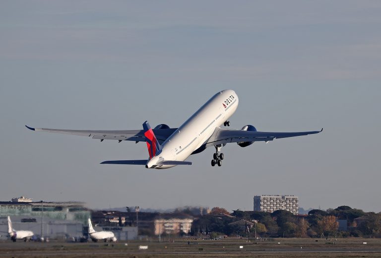 Delta more than doubles fourth-quarter profit, but trims 2024 earnings forecast