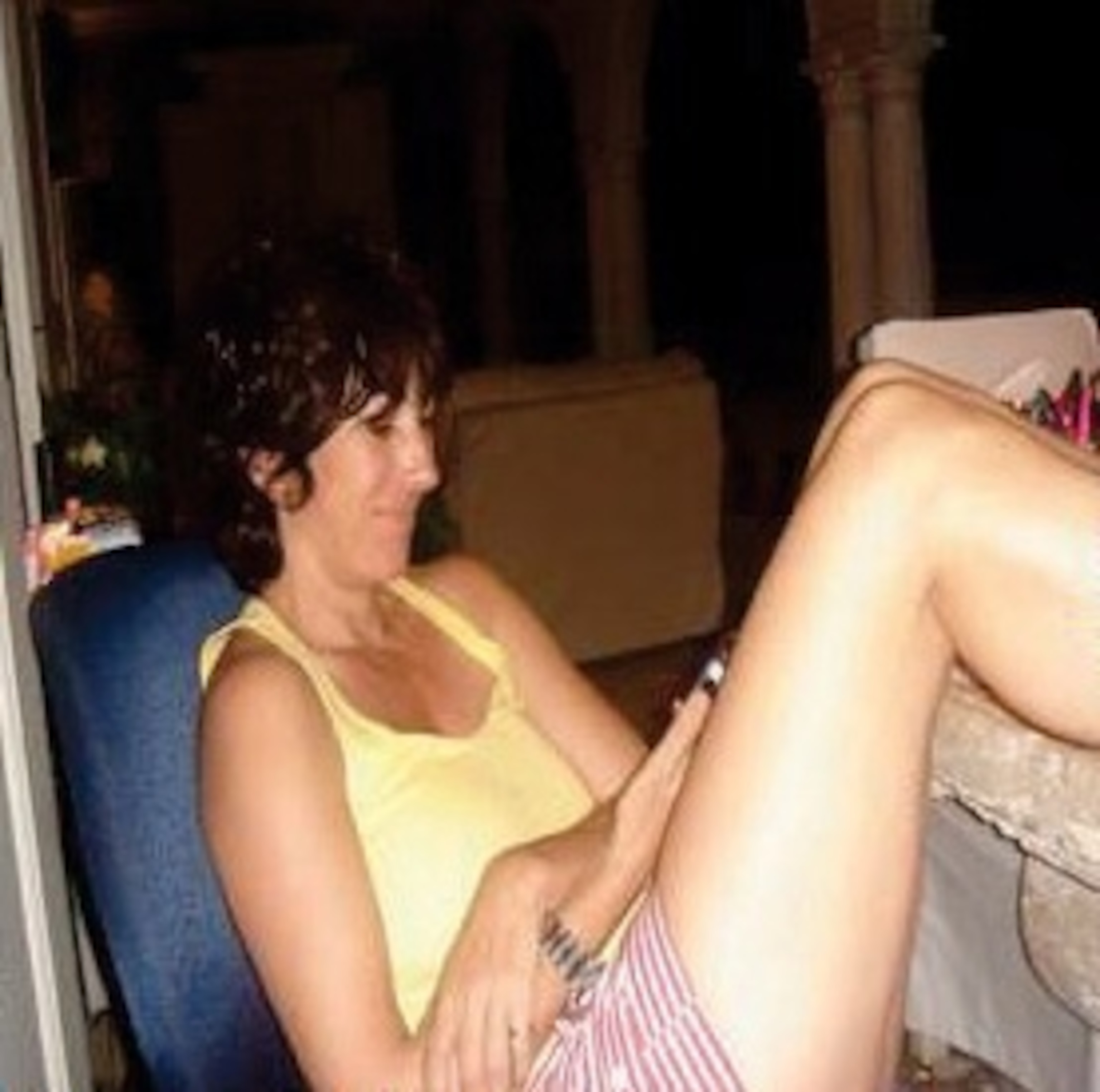 PHOTO: Jeffrey Epstein's longtime companion Ghislaine Maxwell is seen on Epstein's private island in a photo from 2006 that was included in a batch of newly unsealed court documents released Monday.