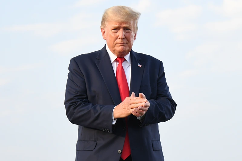 Donald Trump Hosts A Rally In Illinois
MENDON, IL - JUNE 25: Donald Trump arrives to give remarks during a Save America Rally with former US President Donald Trump at the Adams County Fairgrounds on June 25, 2022 in Mendon, Illinois. Trump will be stumping for Rep. Mary Miller in an Illinois congressional primary and it will be Trump's first rally since the United States Supreme Court struck down Roe v. Wade on Friday. (Photo by Michael B. Thomas/Getty Images)