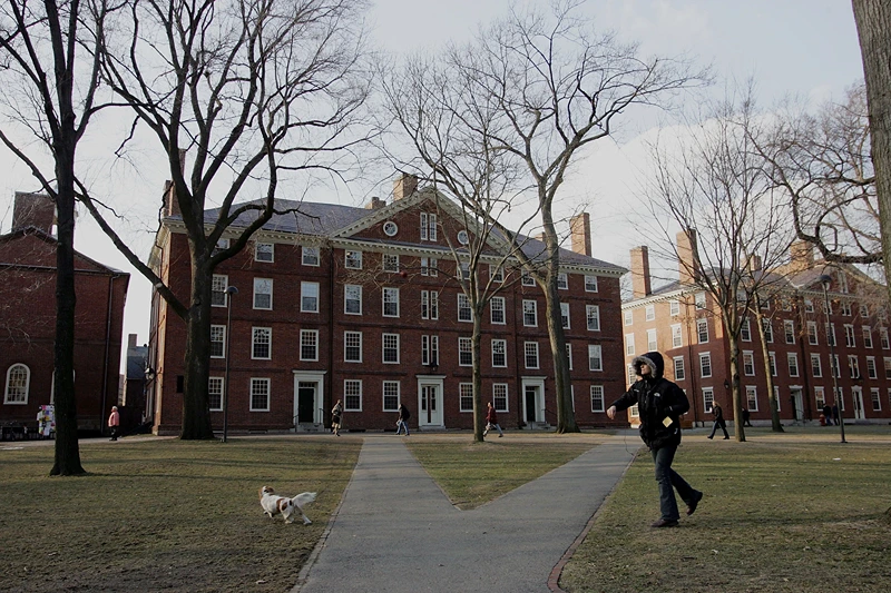 Summers To Step Down As Harvard President
CAMBRIDGE, MA - FEBRUARY 21: Harvard University students walk through the campus on the day Harvard University president, Lawrence H. Summers announced he is resigning at the end of the academic year February 21, 2006 in Cambridge, Massachusetts. Summers will step down from his post after a turbulent five-years at the Ivy League school. (Photo by Joe Raedle/Getty Images)