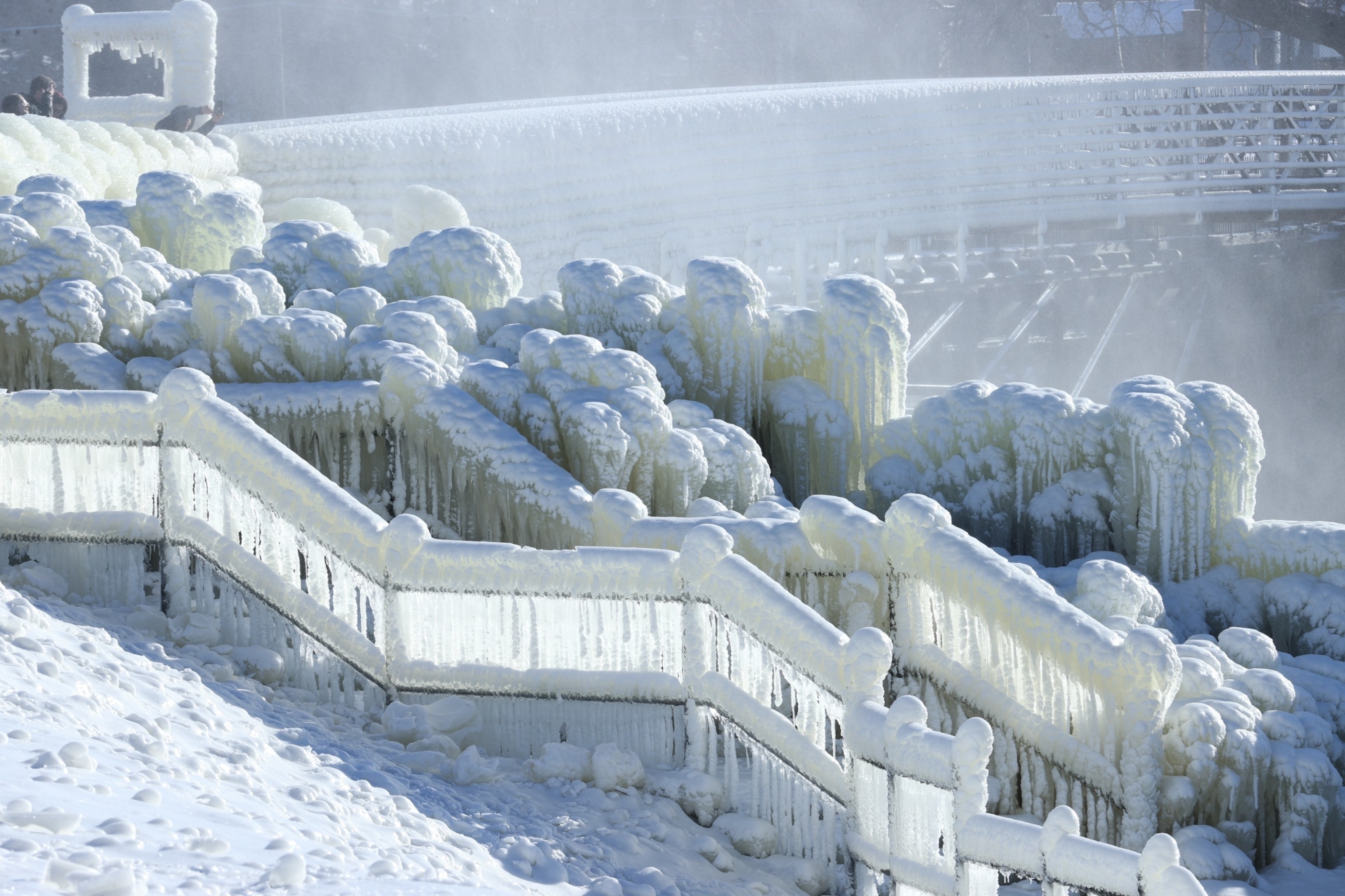 PHOTO: Great Falls freeze due to winter storms in Paterson, N.J. Heavy snowfall and freezing rain cover part of the Pacific Northwest, shutting down roads and causing power outages to nearly 100,000 residents in the state. Jan. 21, 2024.