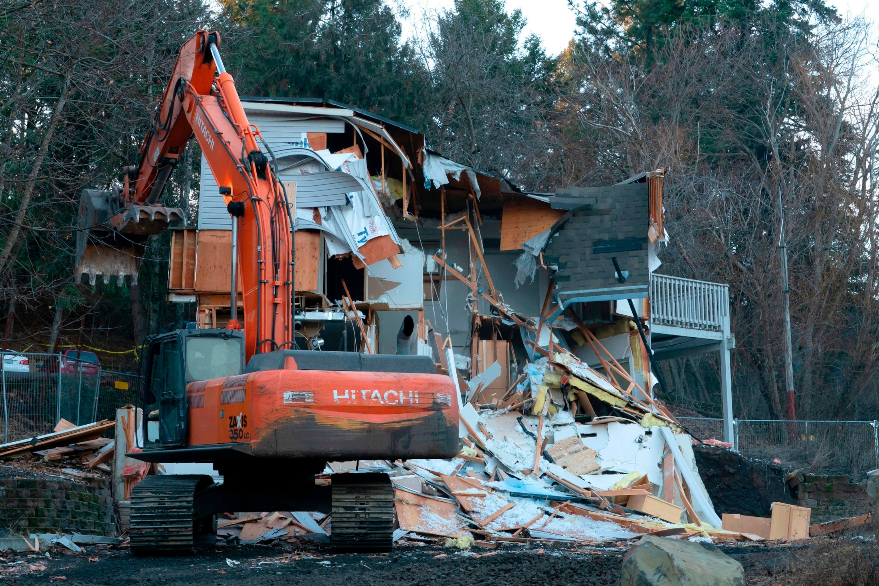 PHOTO: Heavy equipment is used to demolish the house where four University of Idaho students were killed in 2022 on Dec. 28, 2023, in Moscow, Idaho.