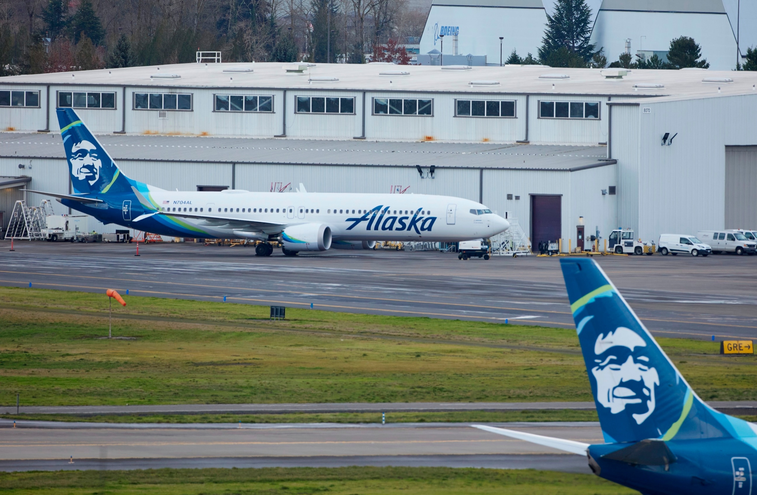 PHOTO: Alaska Airlines N704AL, a 737 Max 9 which made an emergency landing at Portland International Airport after a part of the fuselage broke off mid-flight on Friday, is parked at a maintenance hanger in Portland, Ore., Saturday, Jan. 6, 2024. 