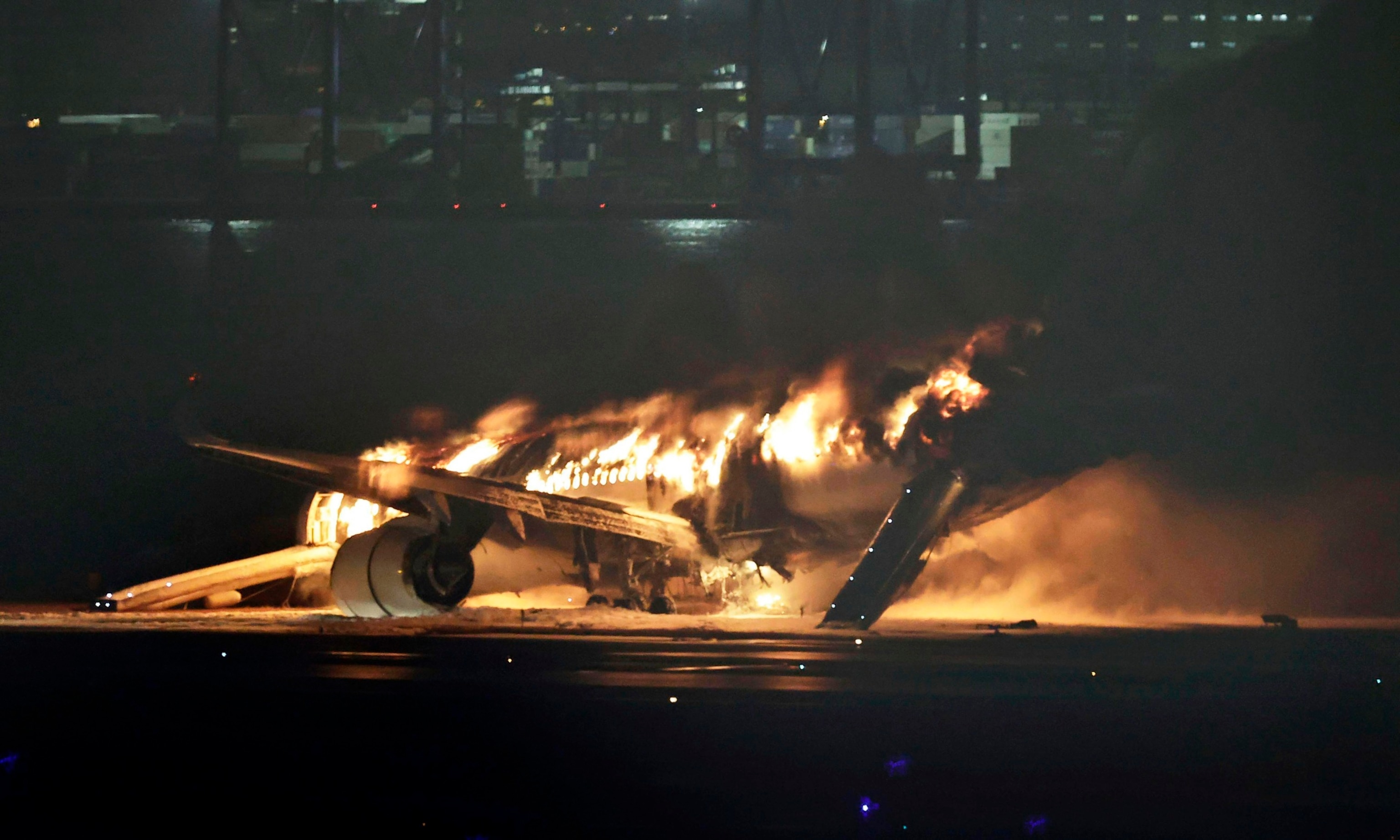 PHOTO: A Japan Airlines plane is on fire on the runway of Haneda airport on Tuesday, Jan. 2, 2024 in Tokyo, Japan.