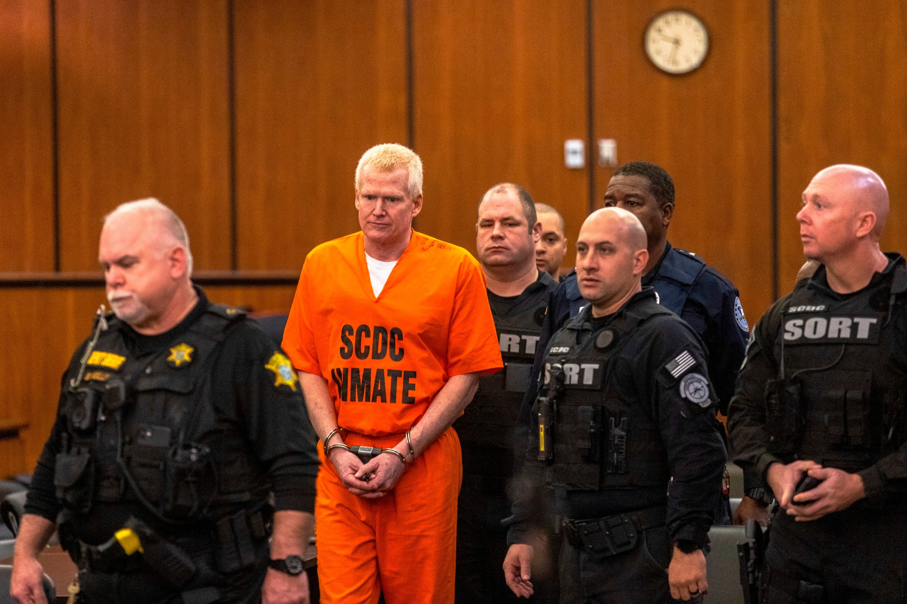 PHOTO: Alex Murdaugh, second from left, is brought out into the courtroom during a jury-tampering hearing at the Richland County Judicial Center, Jan. 29, 2024, in Columbia, S.C.