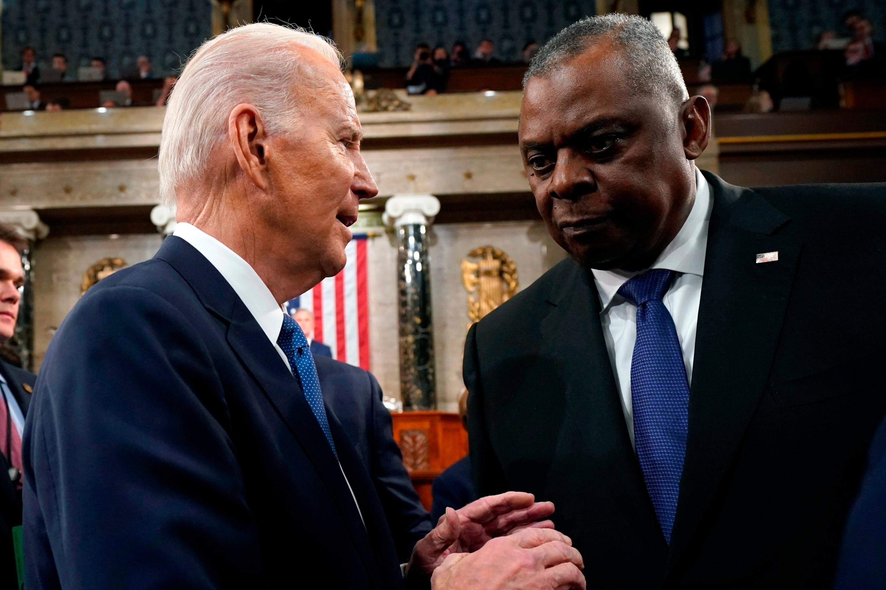 PHOTO: President Joe Biden, left, speaks to Lloyd Austin, secretary of defense, after delivering the State of the Union address at the US Capitol in Washington, DC, Feb. 7, 2023.