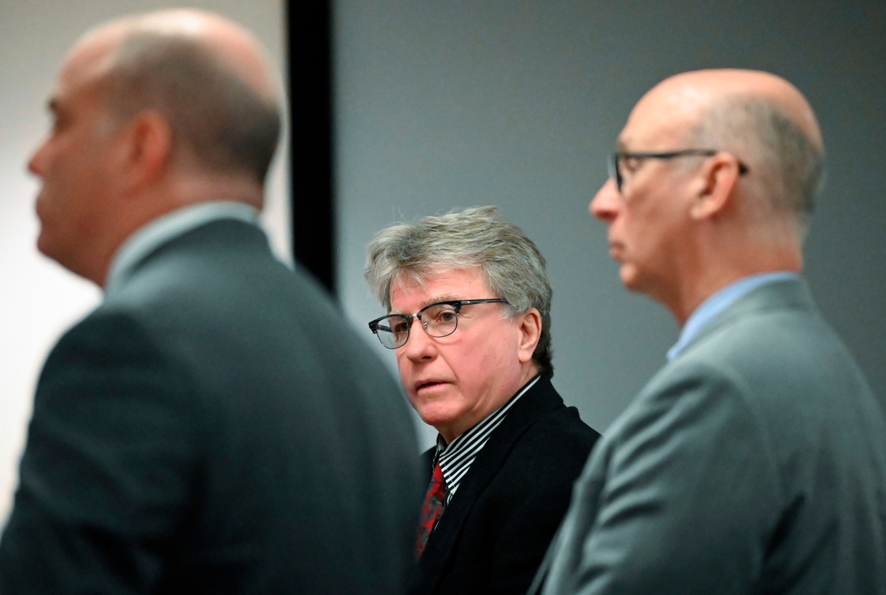 PHOTO: Defendant Kevin Monahan, center, is flanked by his legal defense during opening statements in his murder trial, Jan. 11, 2024, at the Washington County Courthouse in Fort Edward, N.Y.