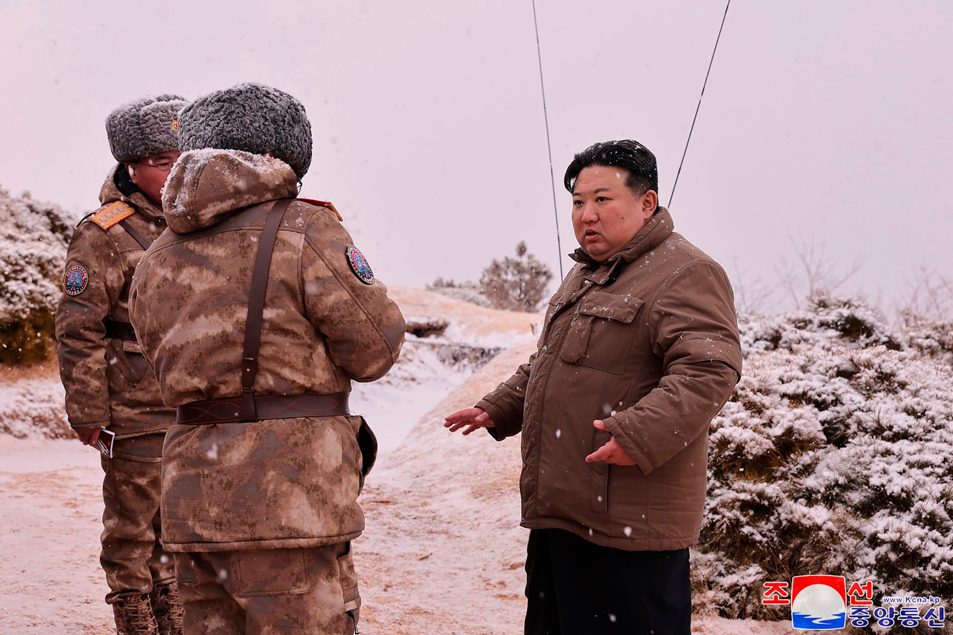 PHOTO: This photo provided by the North Korean government, shows North Korean leader Kim Jong Un, right, as he inspects a test firing of Pulhwasal-3-31 in North Korea Sunday, Jan. 28, 2024.