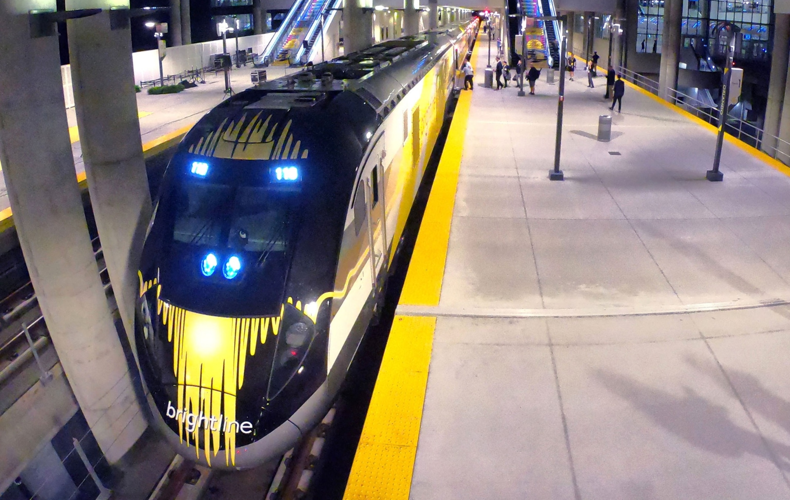 PHOTO: In this Sept. 22, 2023, file photo, the first Brightline train to Miami, for the debut of service from Orlando International Airport, arrives in the station.