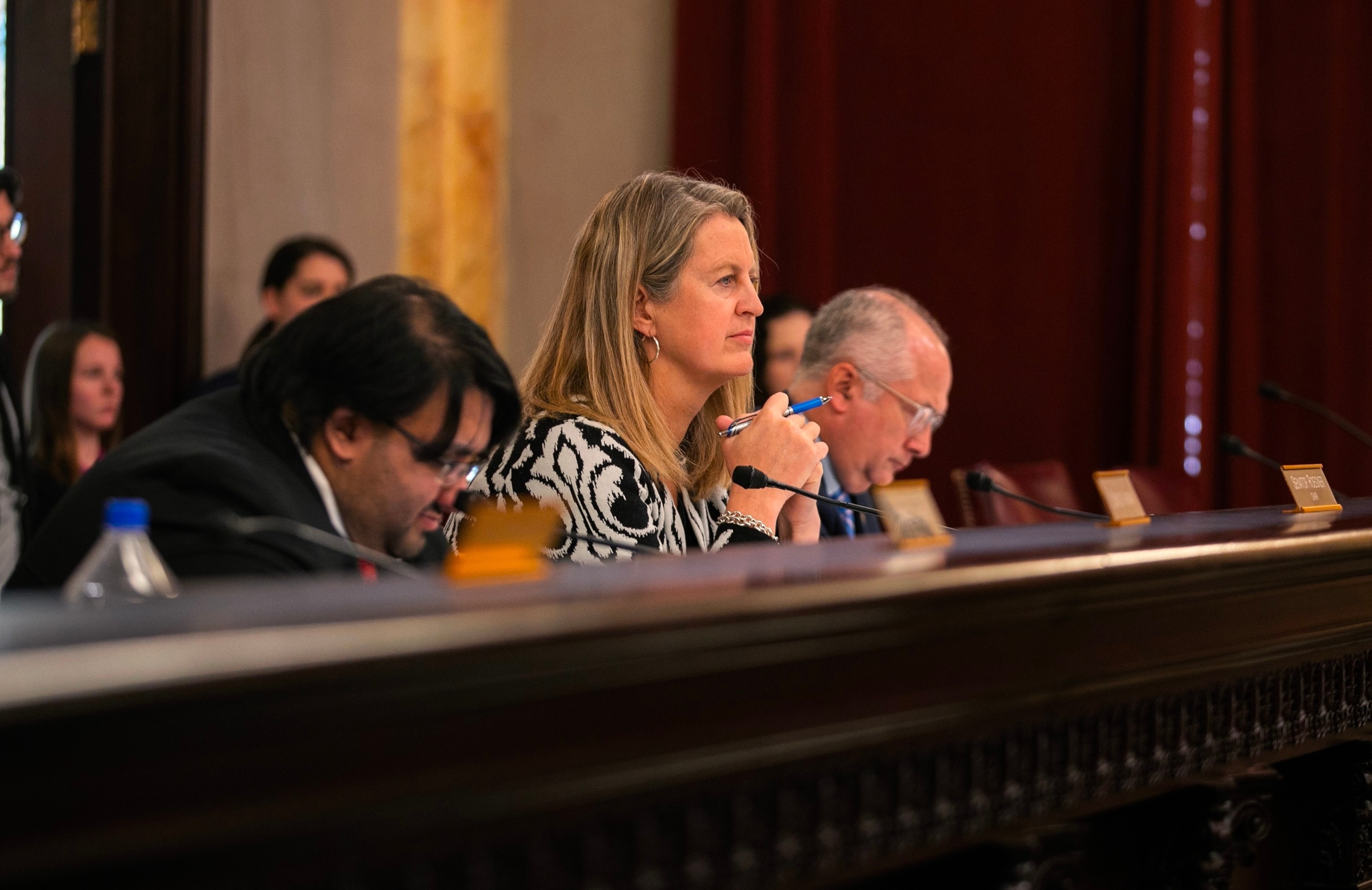 PHOTO: State Sen. Kristina Roegner, R-Ohio, listens to Rep. Gary Click, R-Ohio, speak at a hearing for the Saving Adolescents from Experimentation (SAFE) Act at the Ohio Statehouse, Nov. 15, 2023, in Columbus, Ohio. 