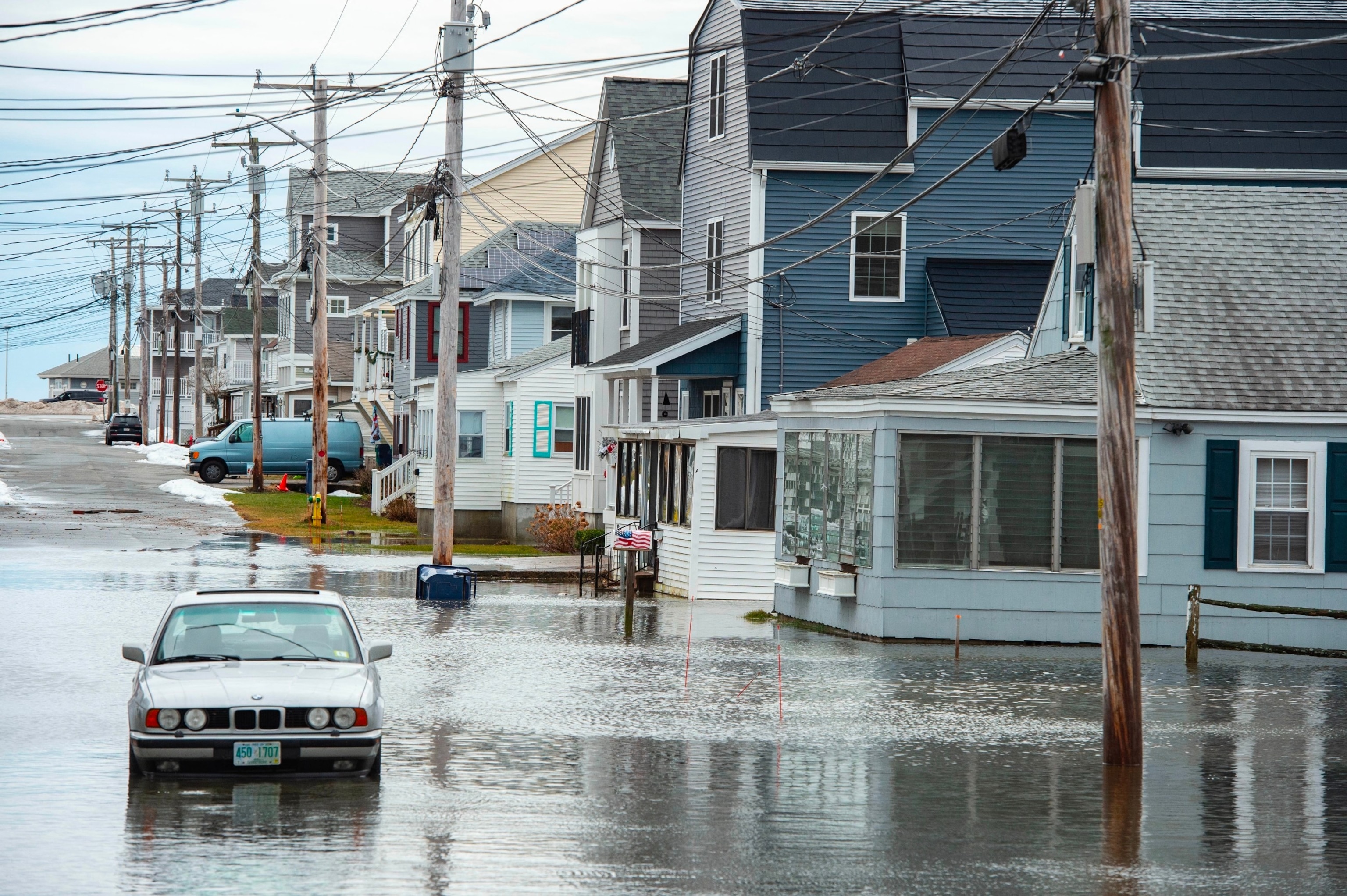PHOTO: Homes and vehicles are surrounded by flood waters in Hampton, New Hampshire on January 10, 2024.