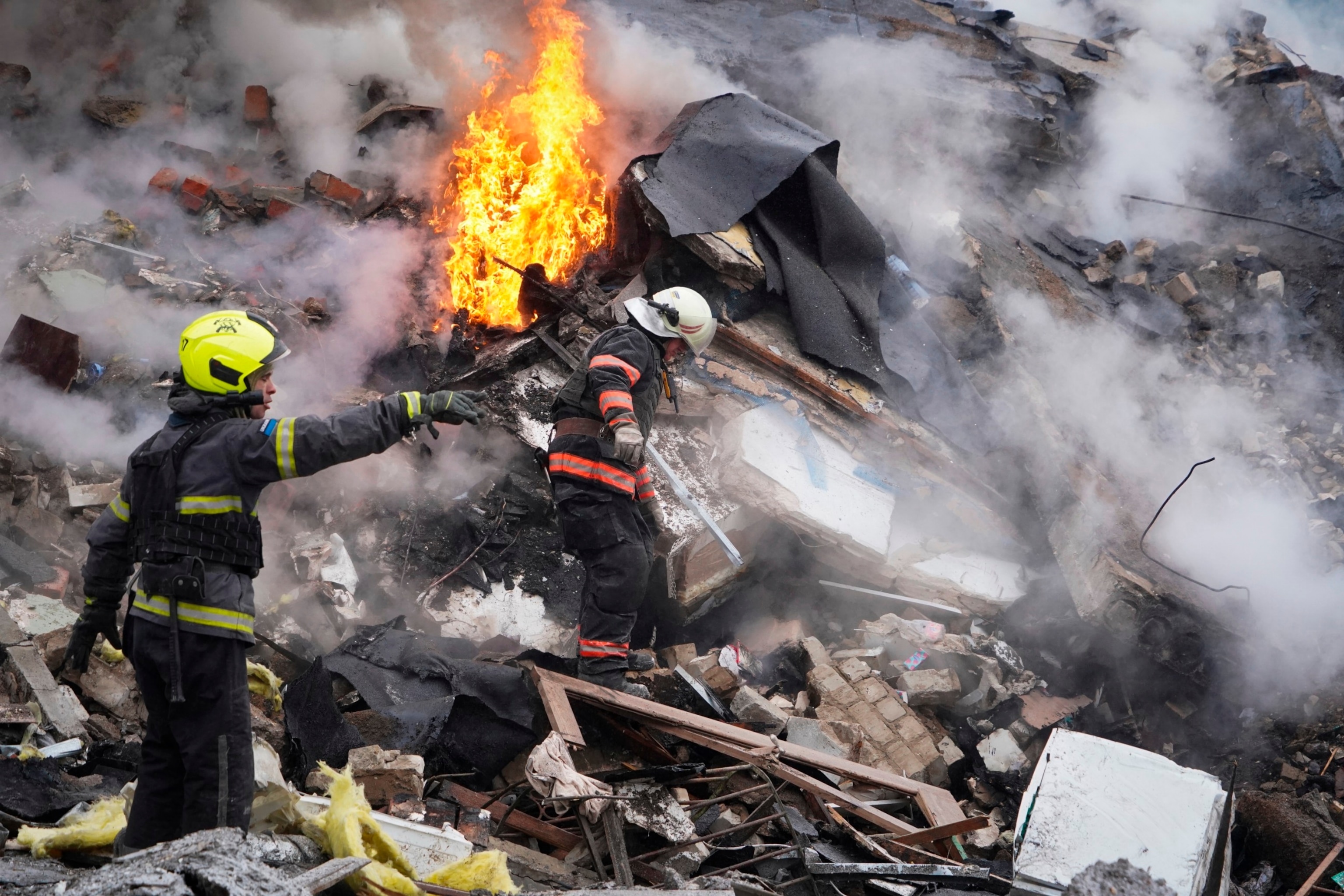 PHOTO: Rescuers work the scene of a building damaged by Russian rocket attack in Kharkiv, Ukraine, Tuesday, Jan. 23, 2024.