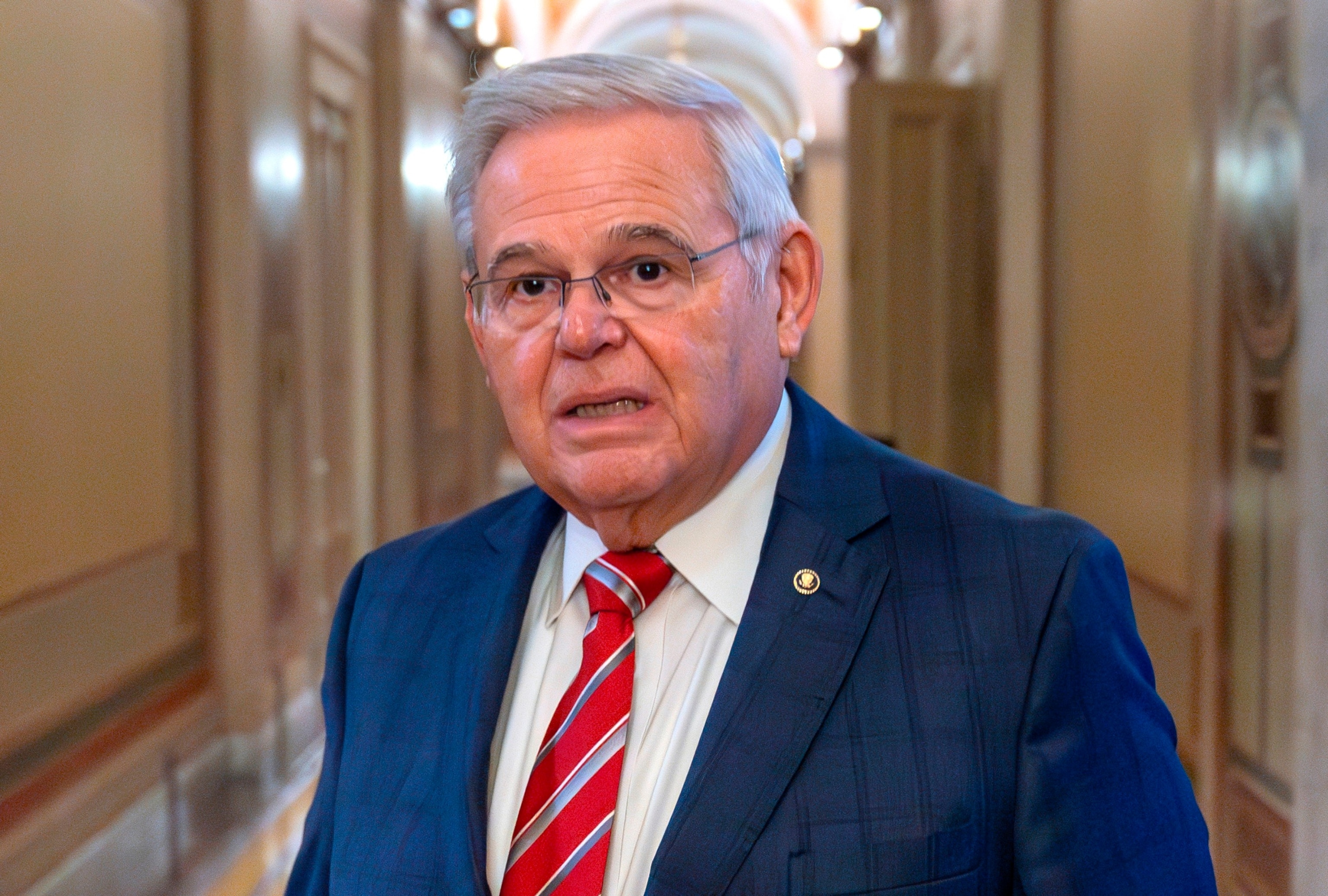 PHOTO: Sen. Bob Menendez, D-N.J., departs the Senate floor in the Capitol, Sept. 28, 2023, in Washington. A federal judge has rejected Menendez's request to delay his bribery trial by two months.