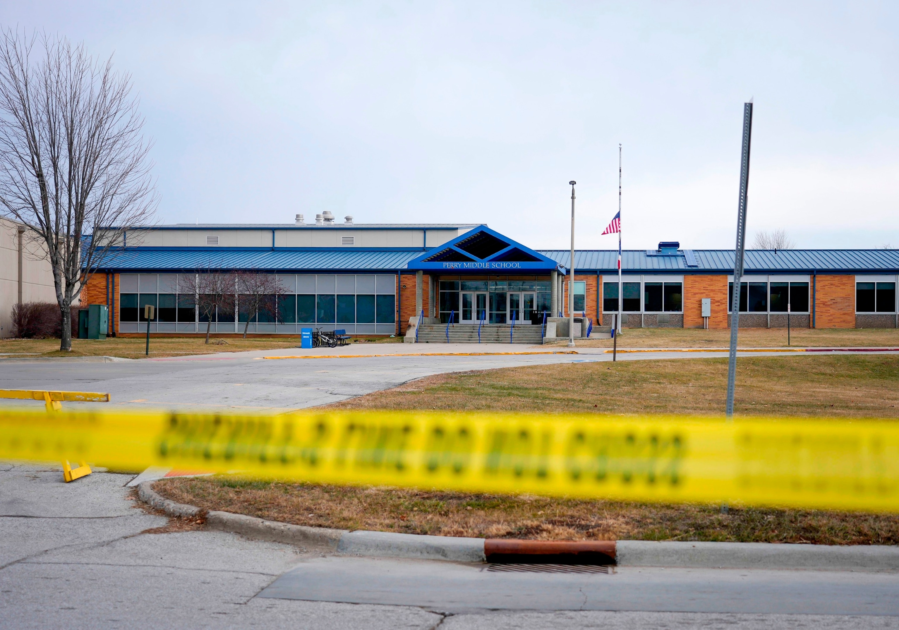 PHOTO: Tape blocks all entrances at the Perry Middle School and High School building on Jan. 5, 2024, in Perry, Iowa. 