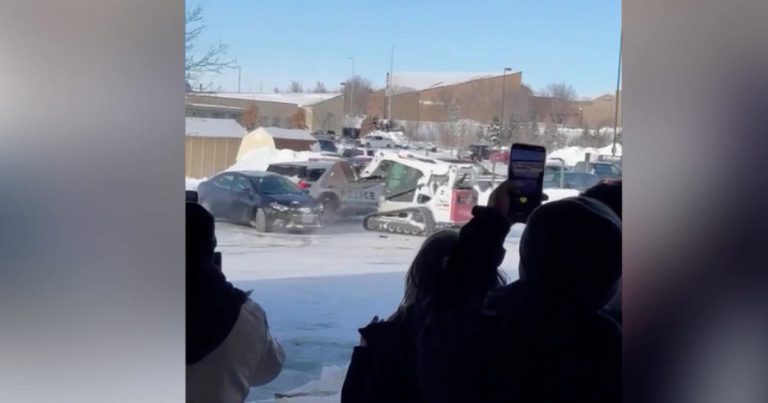Video shows man ramming skid loader into police cruiser in Nebraska