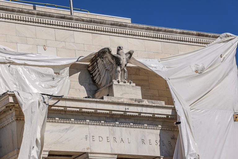 Watchdog report is critical of former Fed officials in stock trading controversy