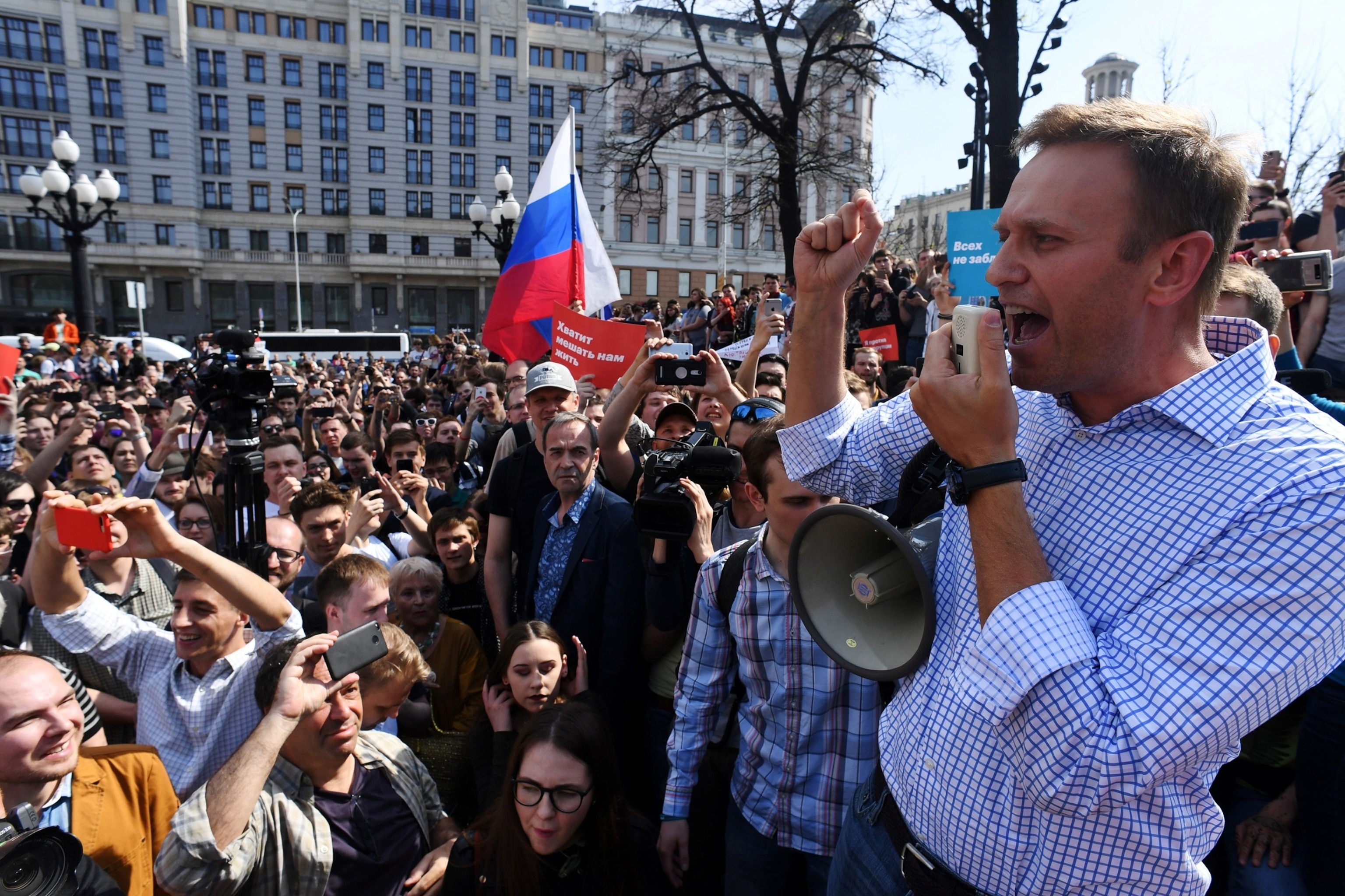 PHOTO: In this May 5, 2018, file photo, Russian opposition leader Alexei Navalny addresses supporters during an unauthorized anti-Putin rally in Moscow, two days ahead of Vladimir Putin's inauguration for a fourth Kremlin term.