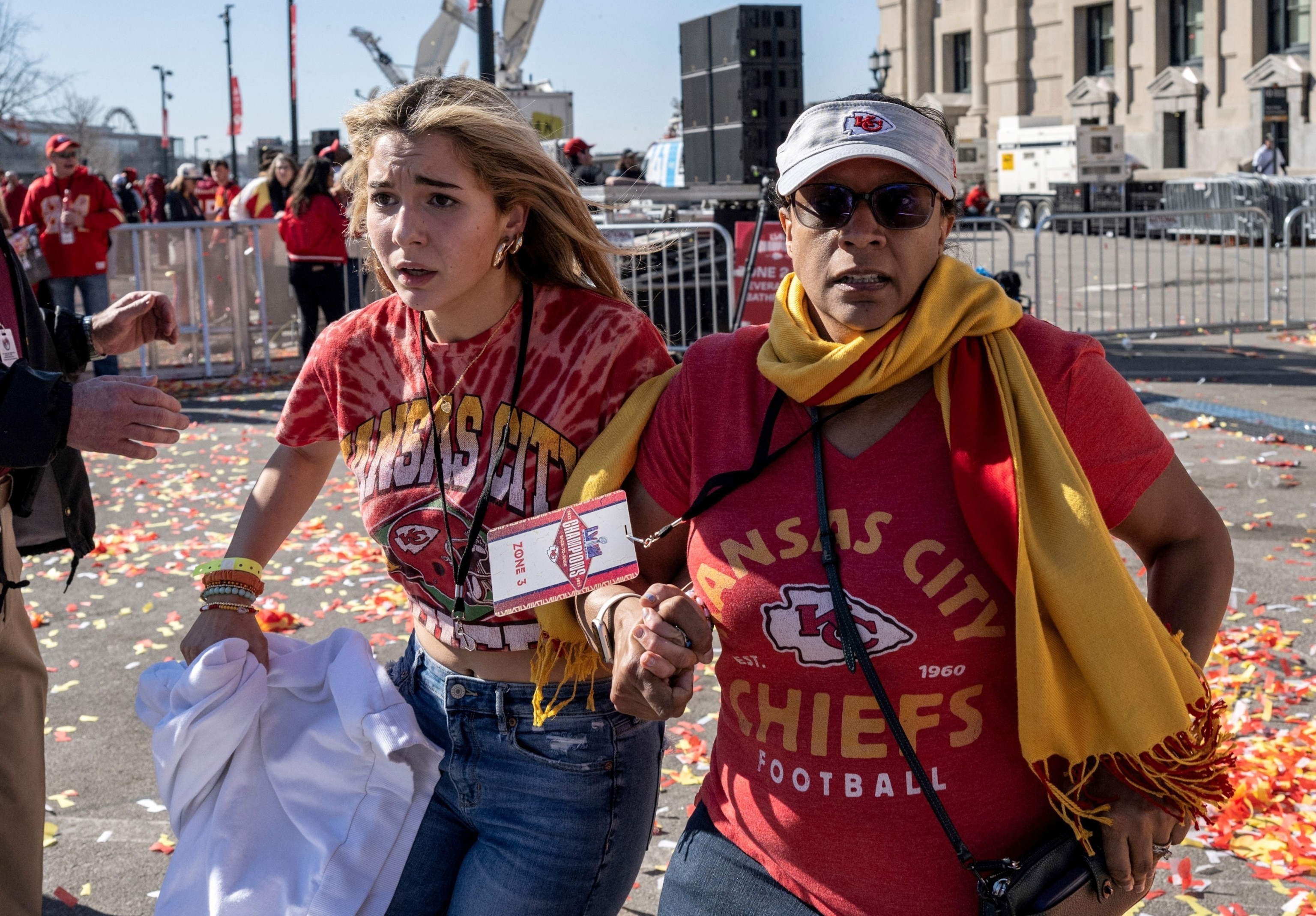 PHOTO: People flee after shots were fired near the Kansas City Chiefs' Super Bowl LVIII victory parade, Feb. 14, 2024, in Kansas City, Mo.