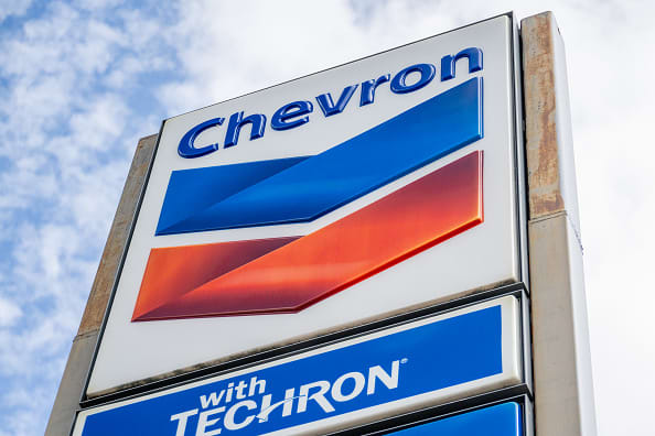 Chevron earnings fall but shareholders see record windfall in 2023, company raises dividend 8%