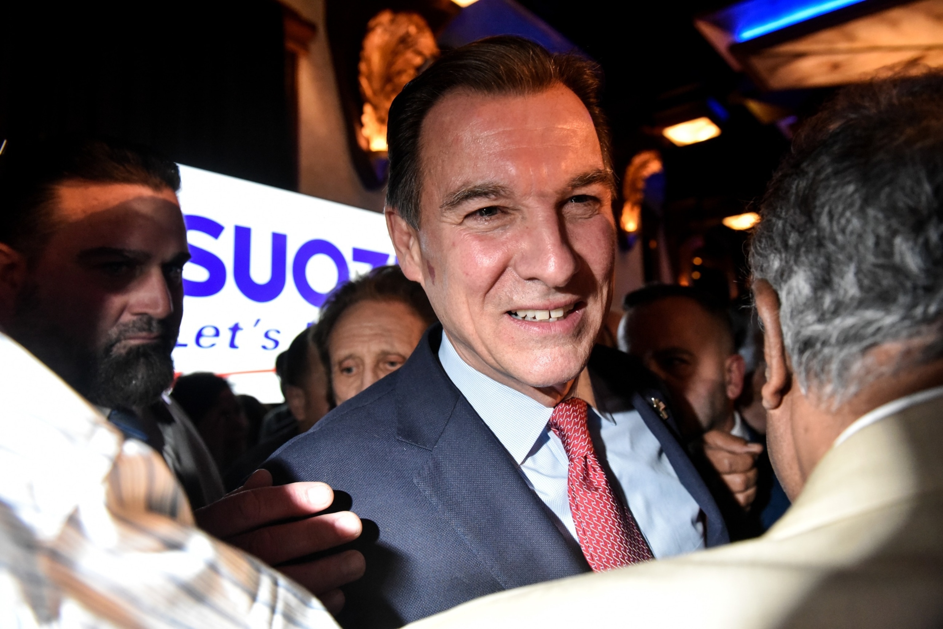 PHOTO: Tom Suozzi greets supporters after his victory in the special election to replace Republican Rep. George Santos on February 13, 2024 in Woodbury, New York.