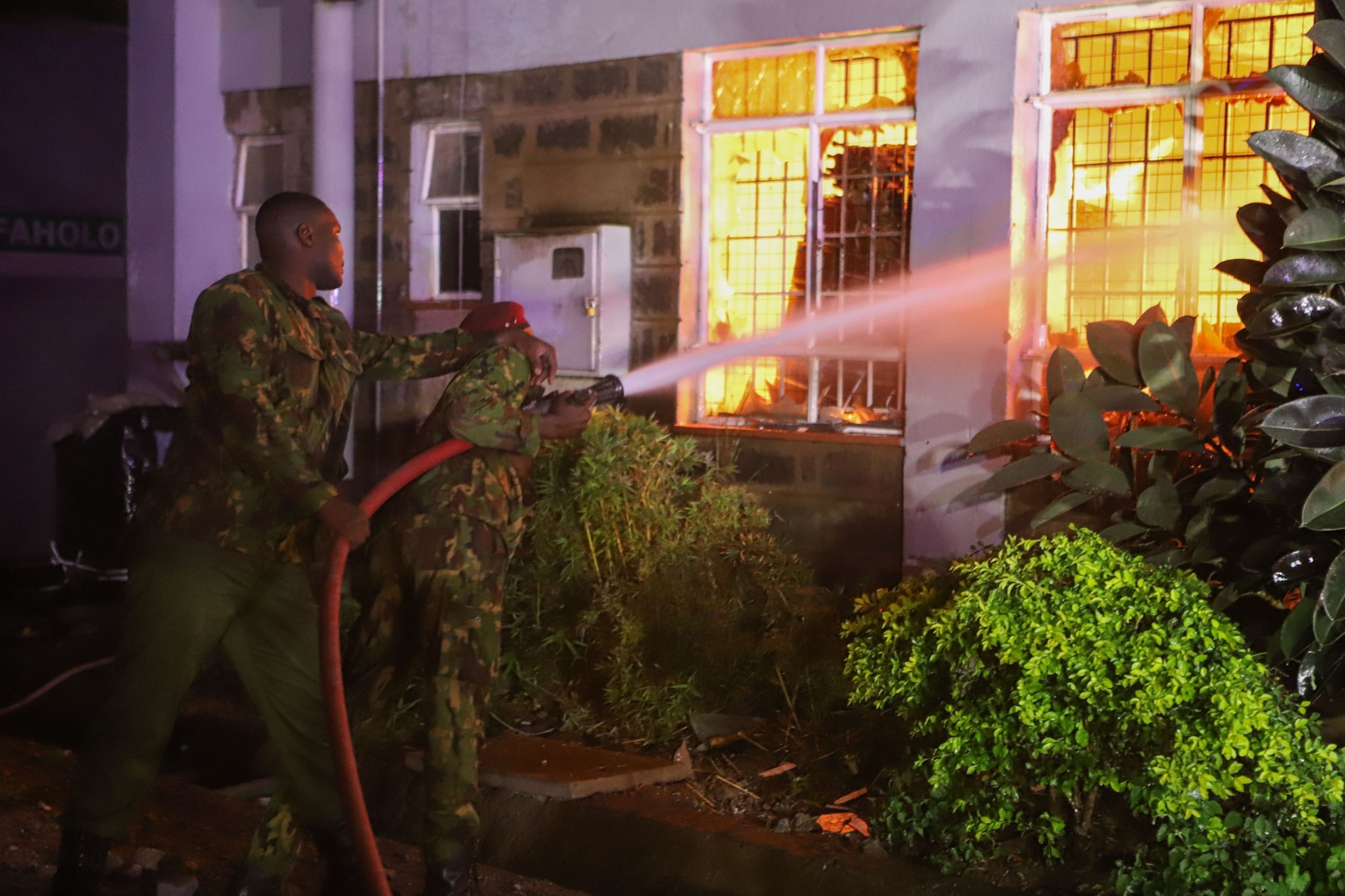 PHOTO: Firefighters attempt to extinguish a fire in Embakasi, Nairobi, Kenya, on Feb. 2, 2024. 