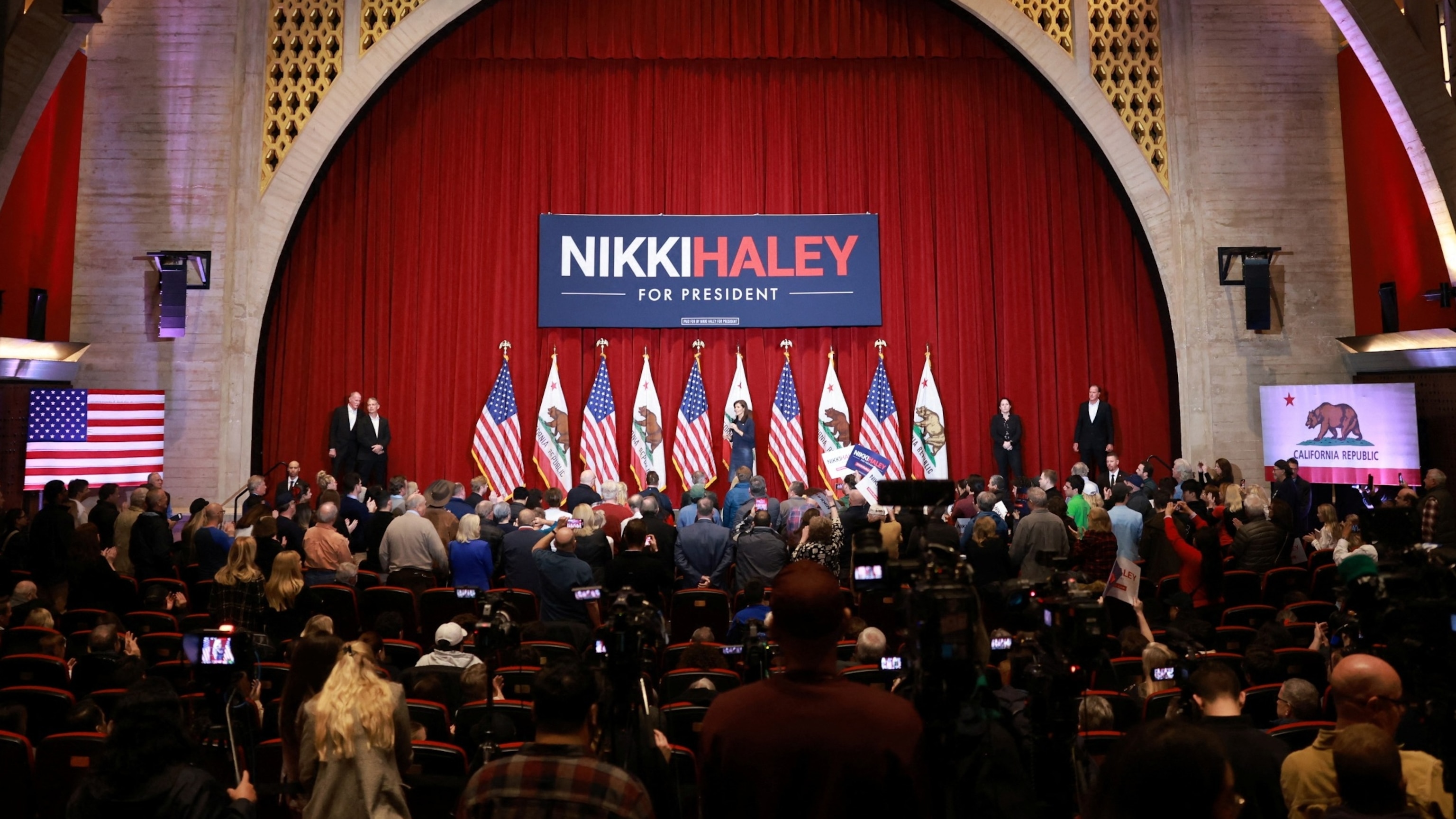 PHOTO: Security staff stand on the stage as Republican presidential candidate Nikki Haley speaks during a pre-Super Tuesday rally at a Hollywood American Legion Post in Los Angeles, Feb. 7, 2024. 