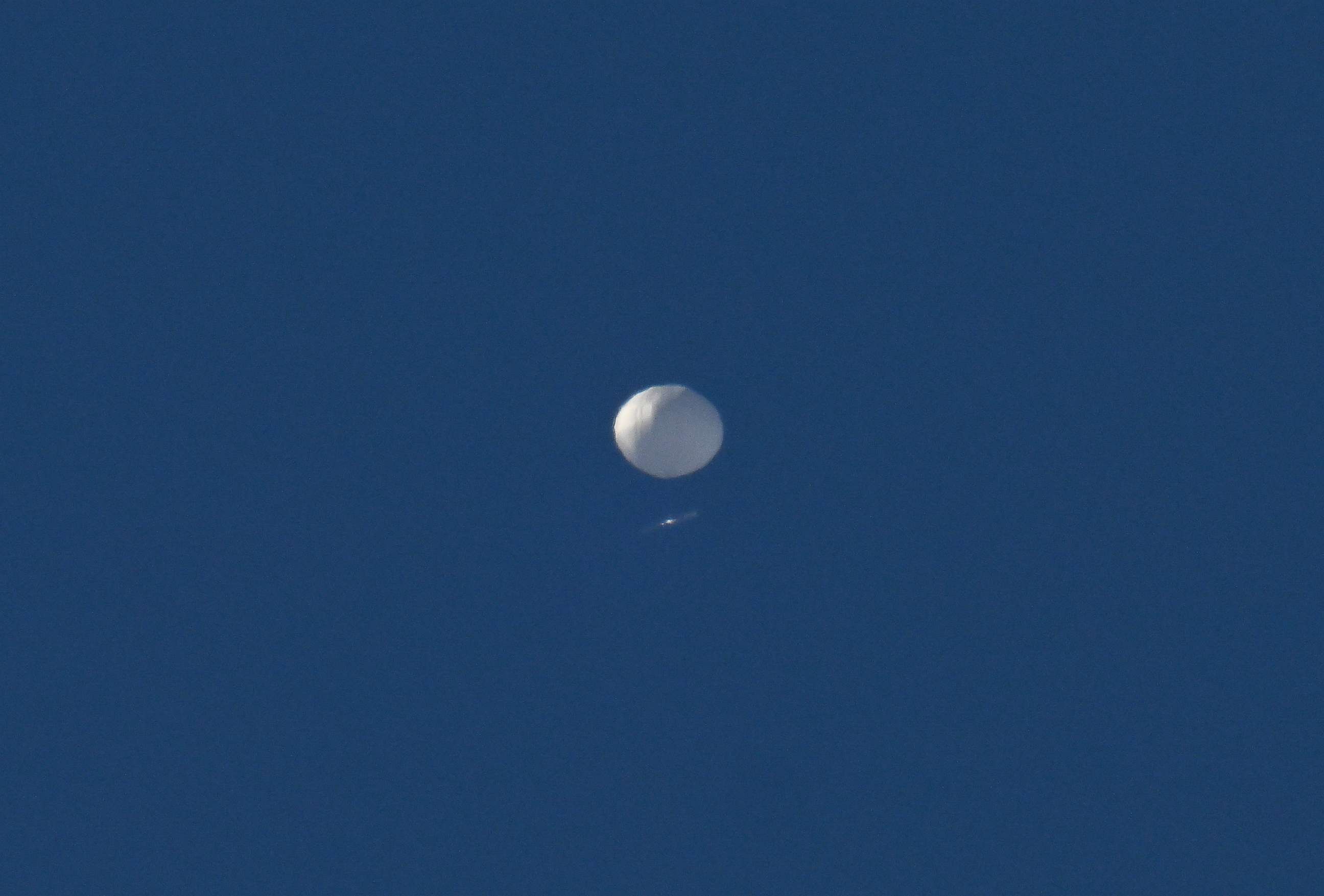 PHOTO: In this Feb. 4, 2023, file photo, a Chinese surveillance balloon is seen flying above Charlotte, N.C. 