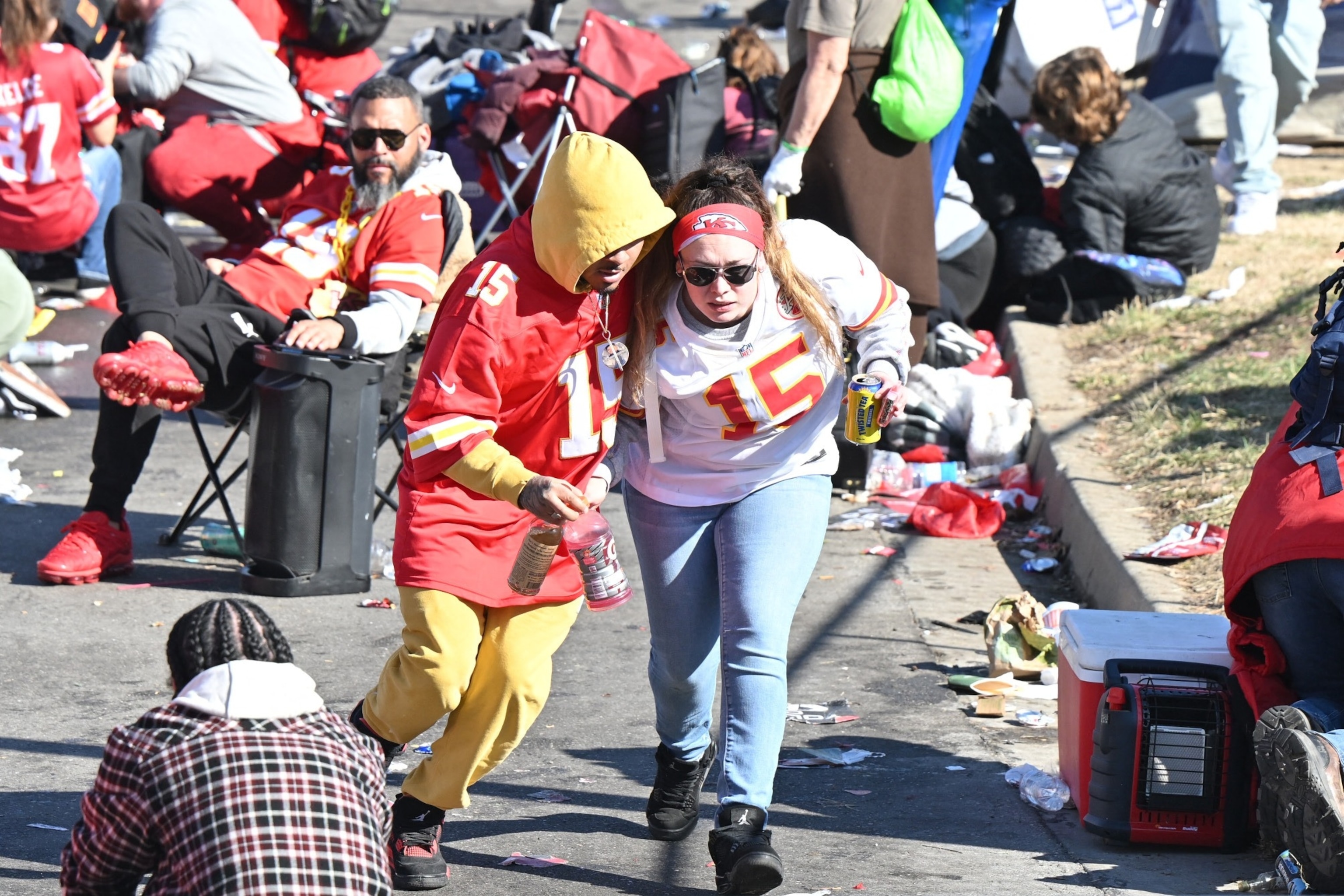 PHOTO: Fans leave the area after shots were fired after the celebration of the Kansas City Chiefs winning Super Bowl LVIII, Feb 14, 2024; Kansas City, Mo.