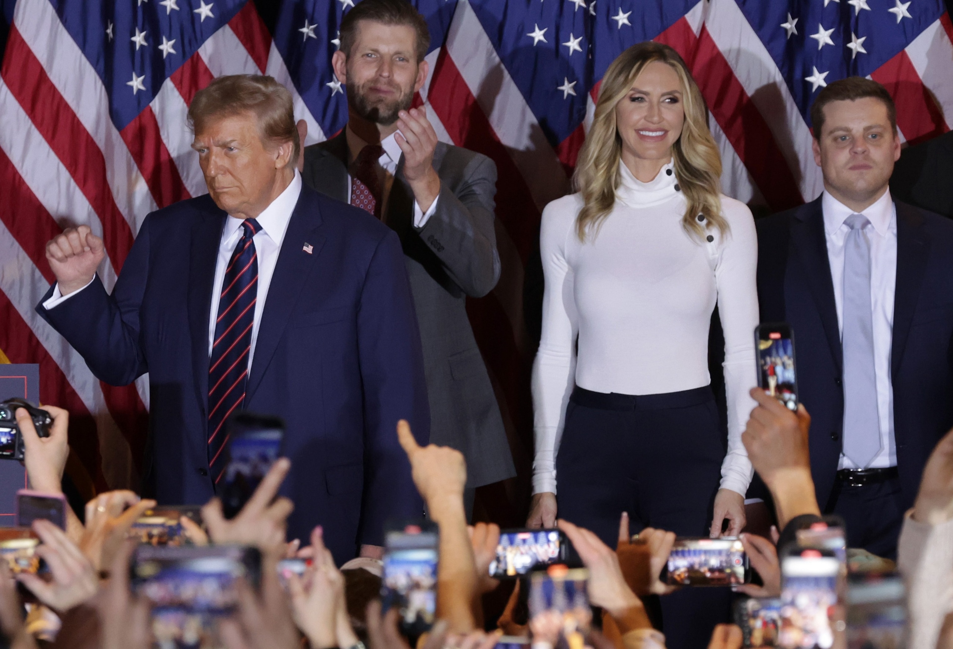 PHOTO: Republican presidential candidate and former U.S. President Donald Trump delivers remarks alongside Eric and Lara Trump during his primary night rally at the Sheraton on Jan. 23, 2024 in Nashua, N. H.