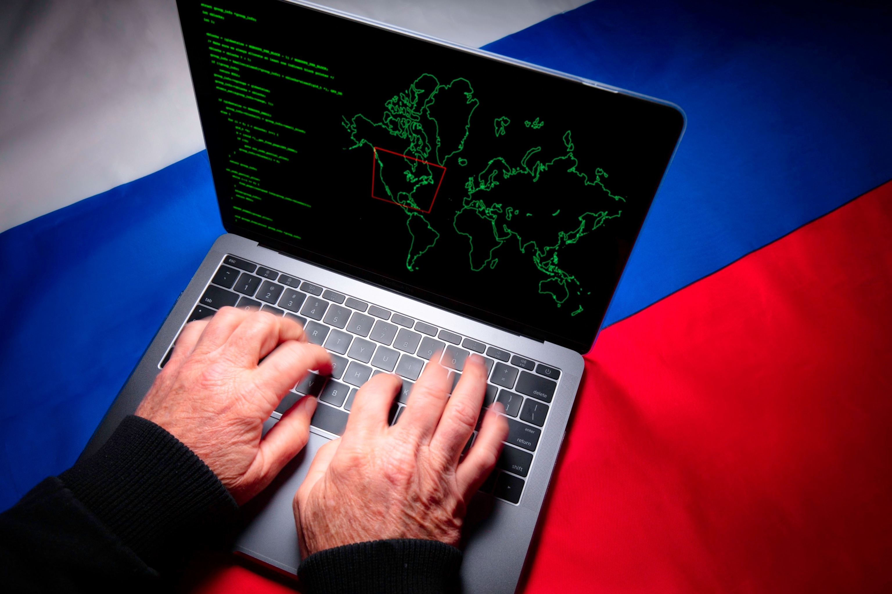 PHOTO: A laptop is seen on a Russian flag in this undated stock photo.