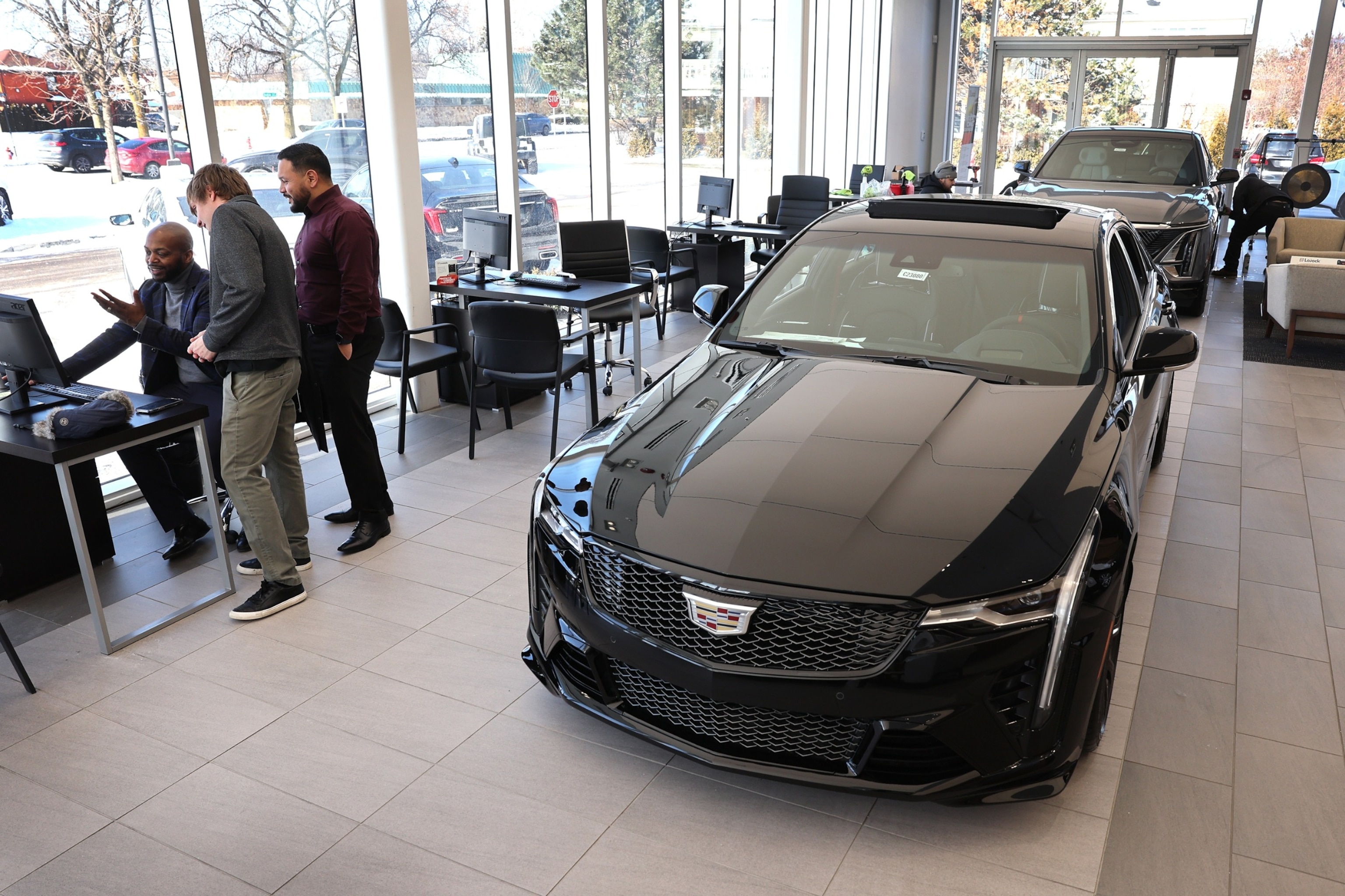 PHOTO: In this Jan. 31, 2023, file photo, Cadillac vehicles are offered for sale at a dealership in Lincolnwood, Illinois. 