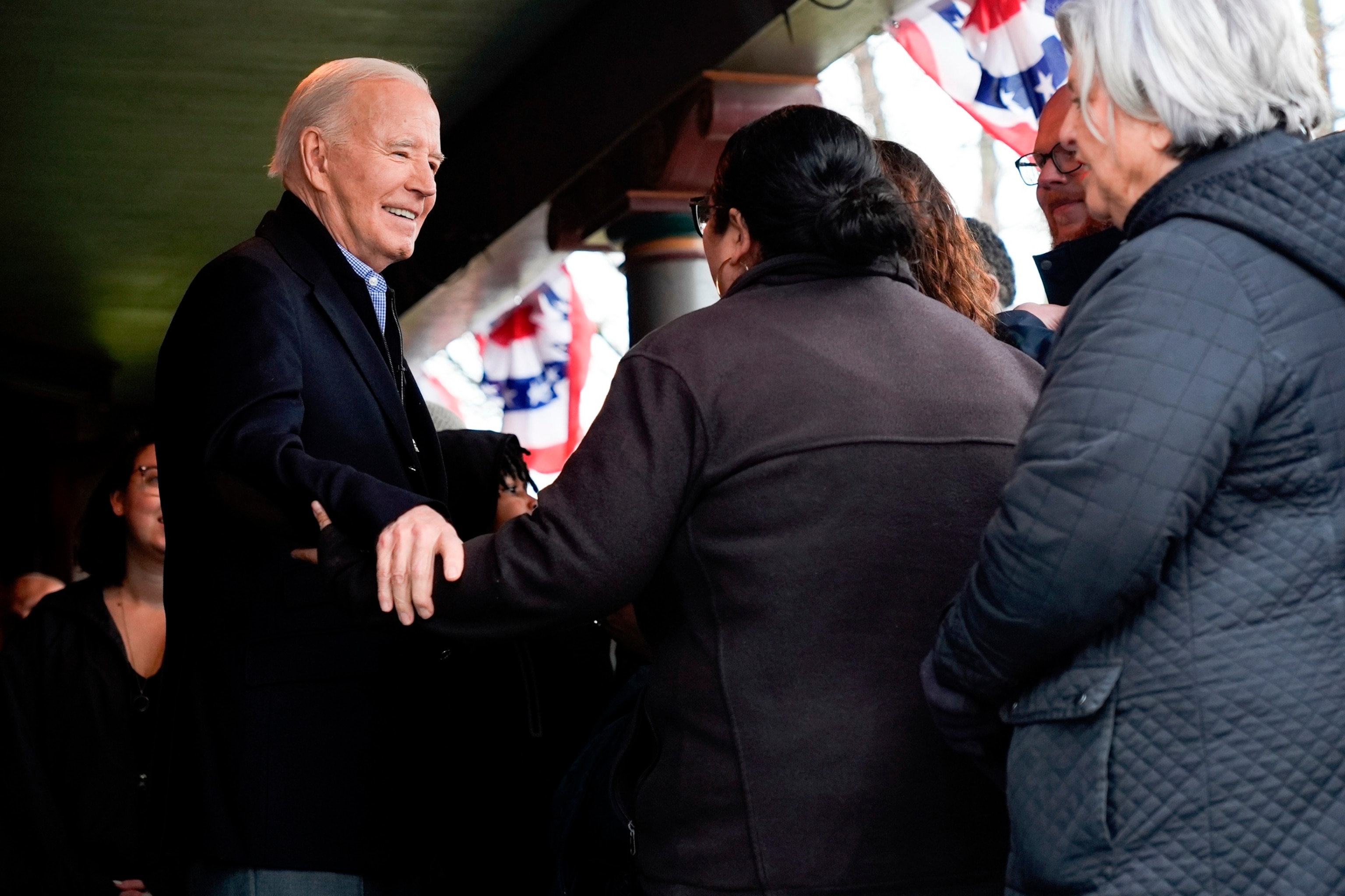 PHOTO: President Joe Biden talks with supporters during a campaign event in Saginaw, Mich., on March 14, 2024. 