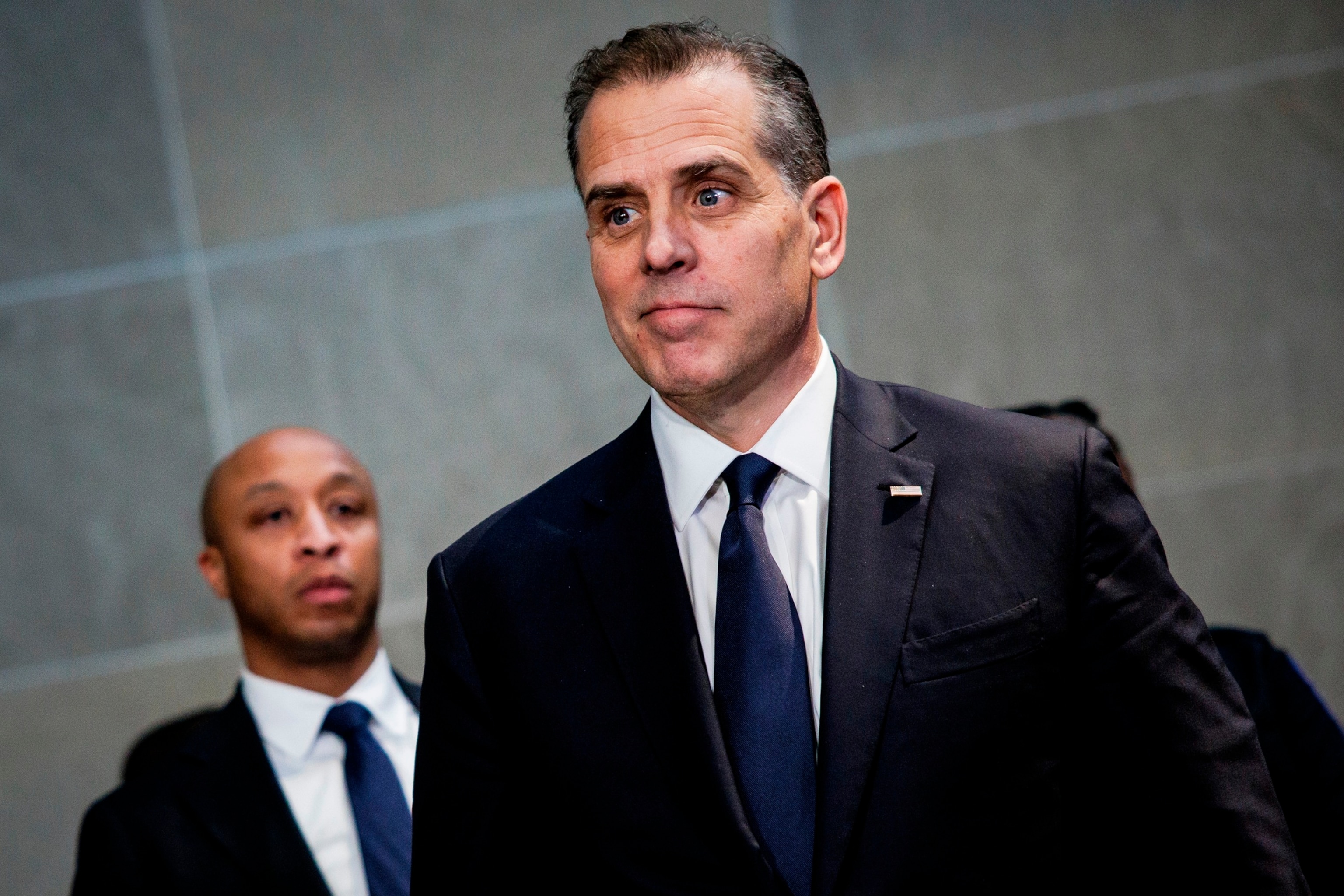 PHOTO: Hunter Biden, son of President Joe Biden, listens as his attorney makes a statement to the press following a closed-door deposition, on February 28, 2024, in Washington, D.C. 