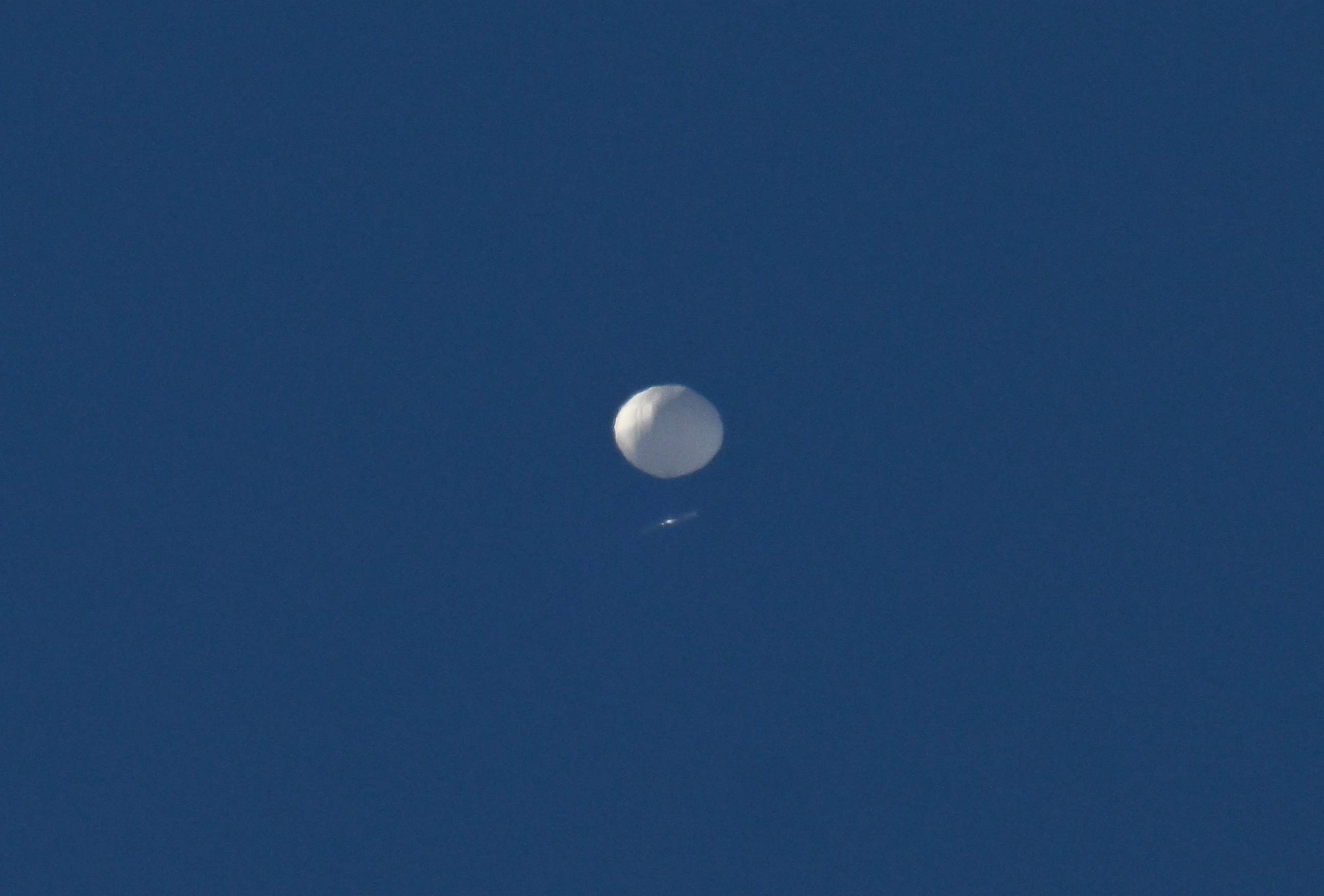 PHOTO: In this Feb. 4, 2023, file photo, a Chinese surveillance balloon is seen flying above Charlotte, N.C. 