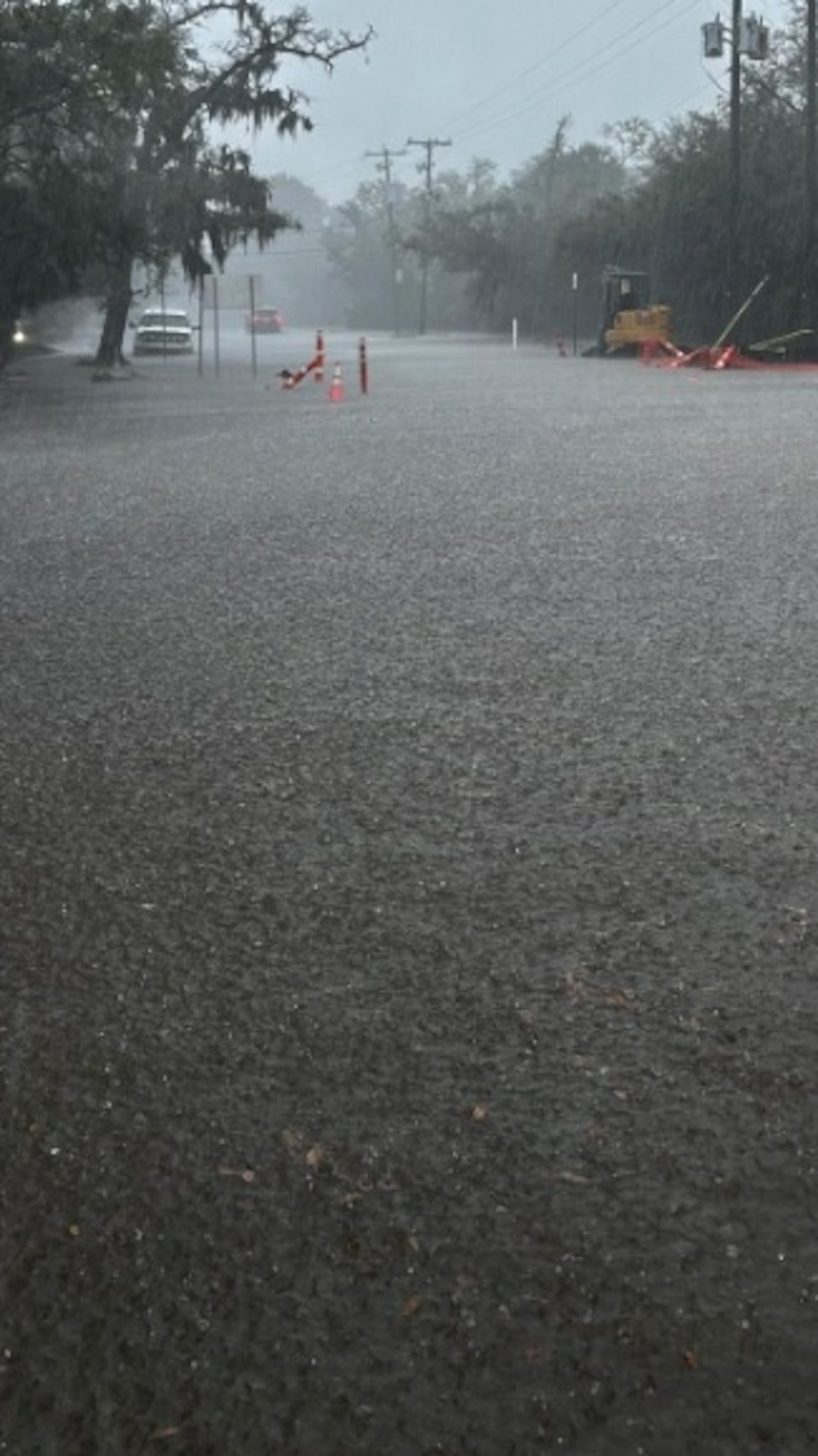 PHOTO: In this photo released by the Isle of Palms Police Department, on March 9, 2024, file photo, rain and flood waters are shown on a road in Isle of Palms, S.C.