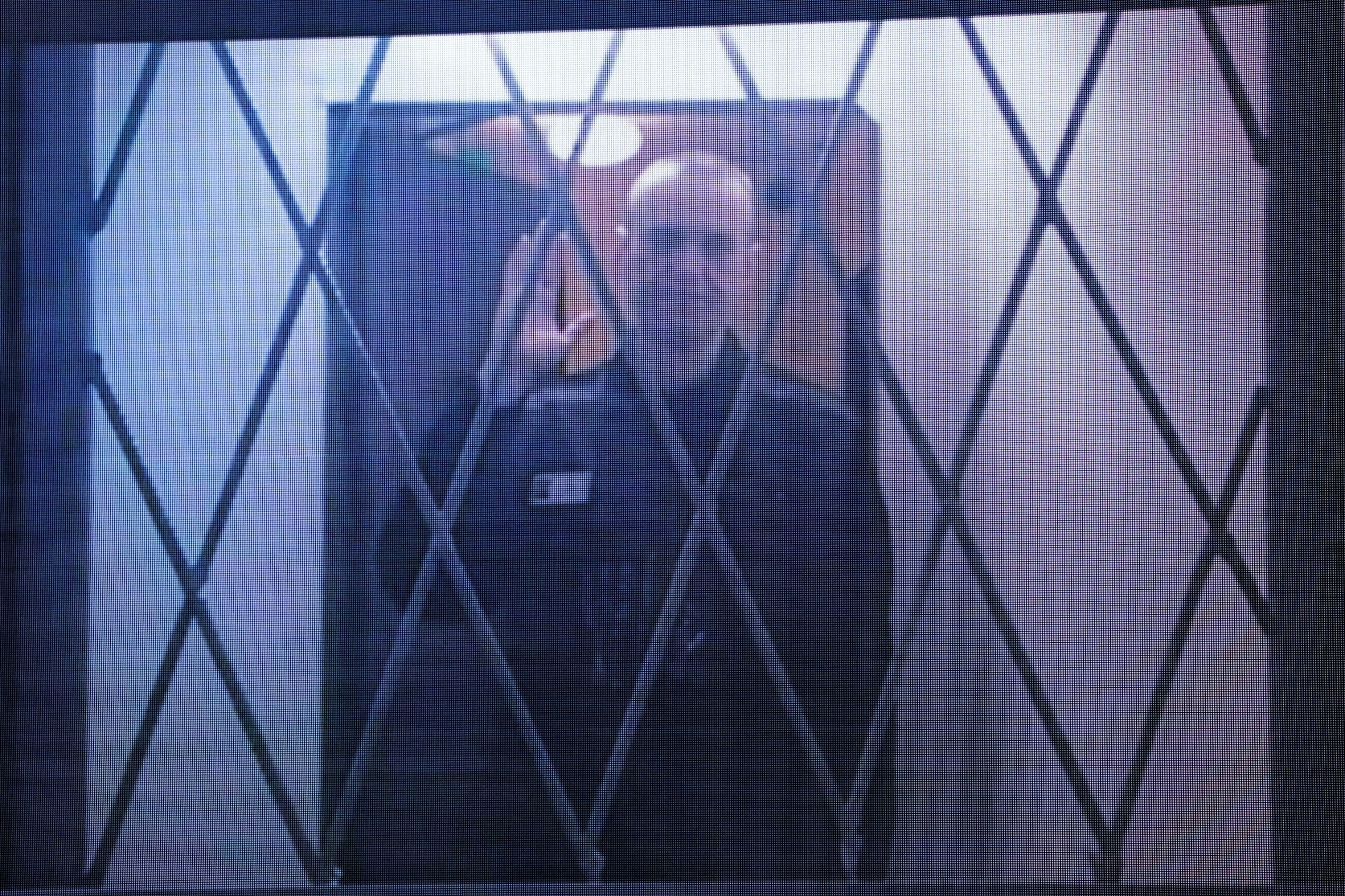 PHOTO: Jailed Russian opposition figure Alexei Navalny is seen on a screen via a video link from the IK-3 penal colony above the Arctic circle at the Supreme Court in Moscow, Jan. 11, 2024.