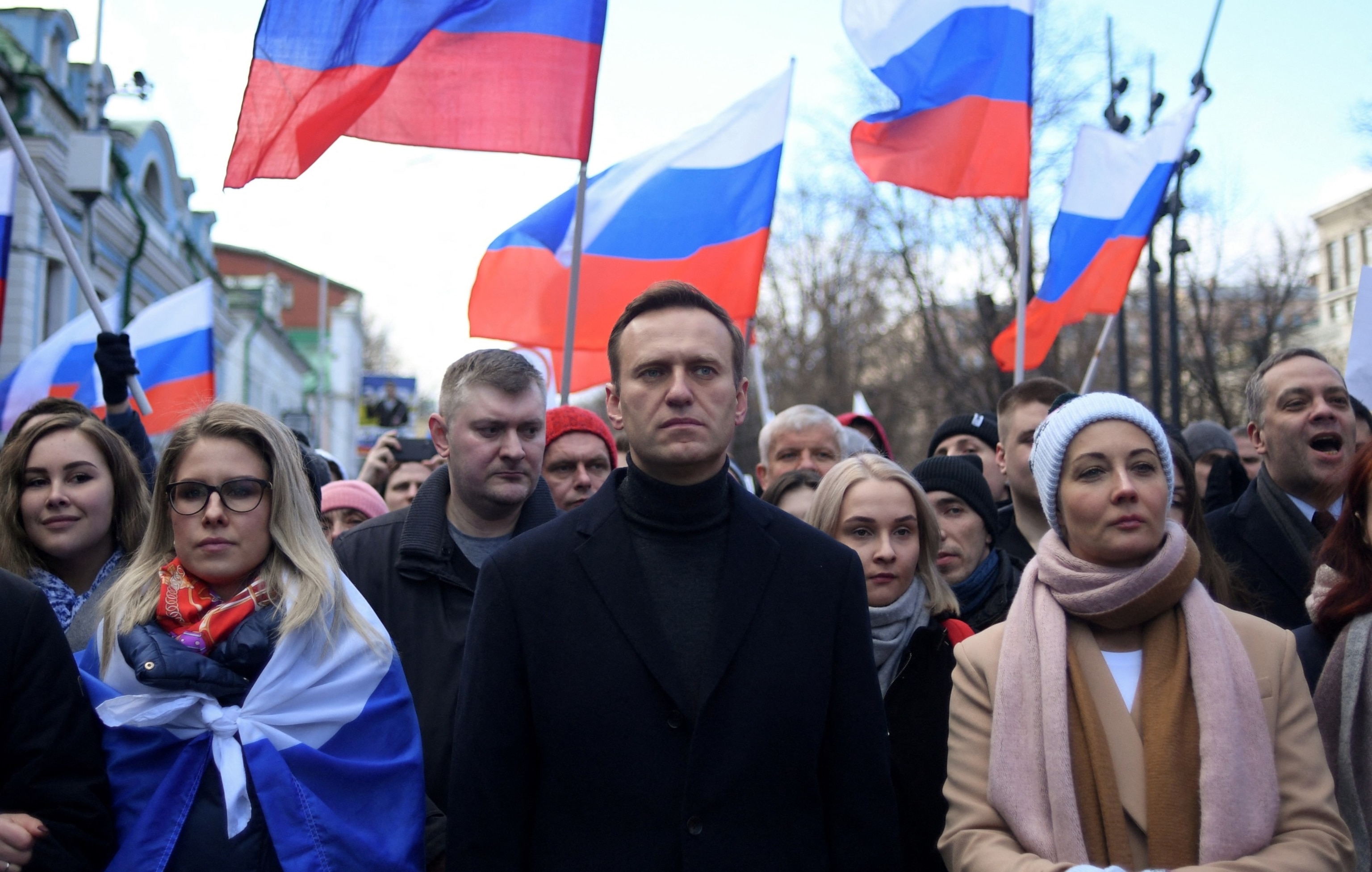 PHOTO: Russian opposition leader Alexei Navalny, his wife Yulia, opposition politician Lyubov Sobol and other demonstrators march in memory of murdered Kremlin critic Boris Nemtsov in downtown Moscow, Feb. 29, 2020. 