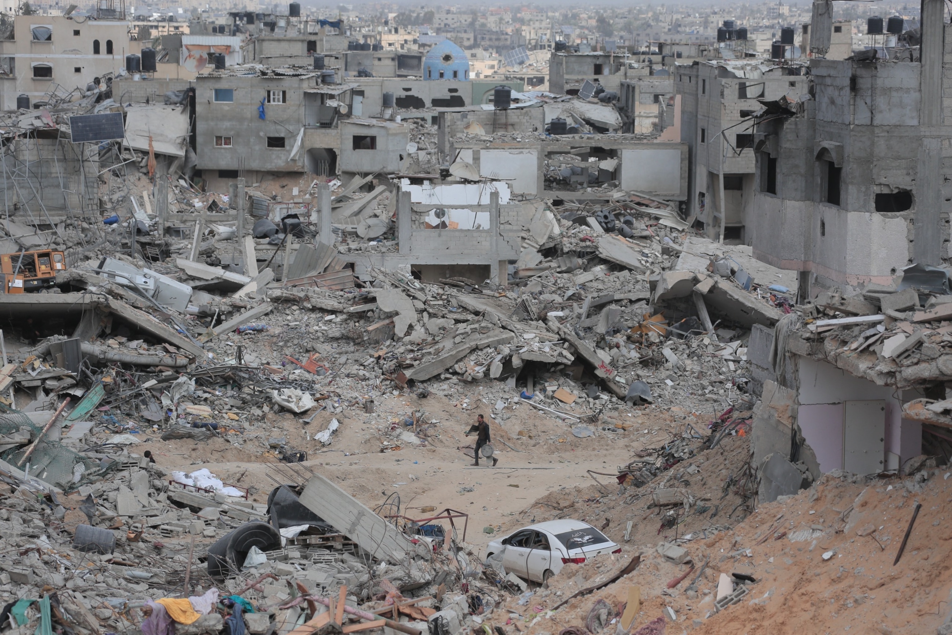 PHOTO: A Palestinian man walks amid the rubble of houses destroyed by Israeli bombardment in Khan Yunis in the southern Gaza Strip, Mar. 6, 2024.