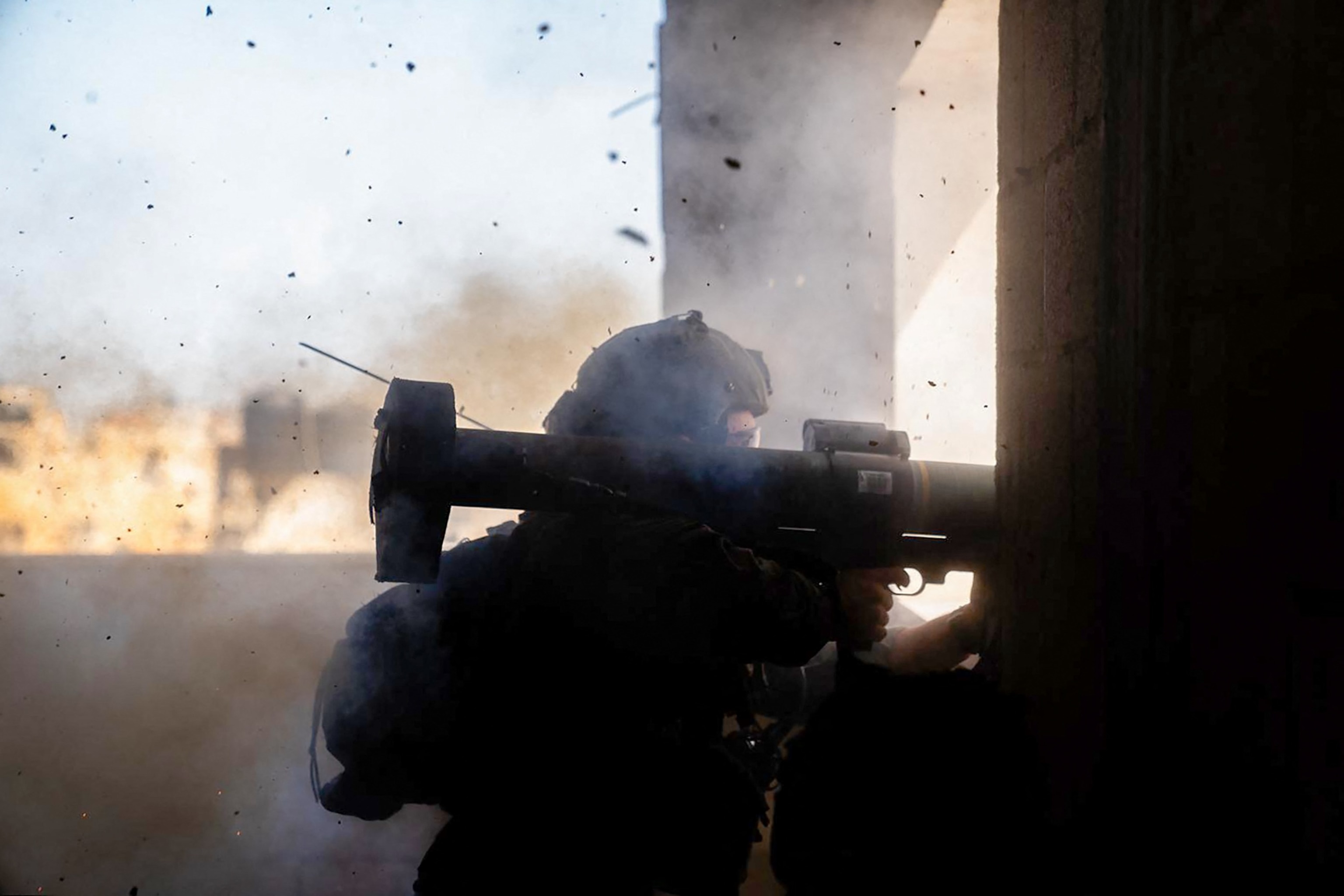 PHOTO: An Israeli army soldier fires a weapon in the Gaza Strip amid ongoing battles between Israel and the Palestinian militant group Hamas, Feb. 29, 2024.