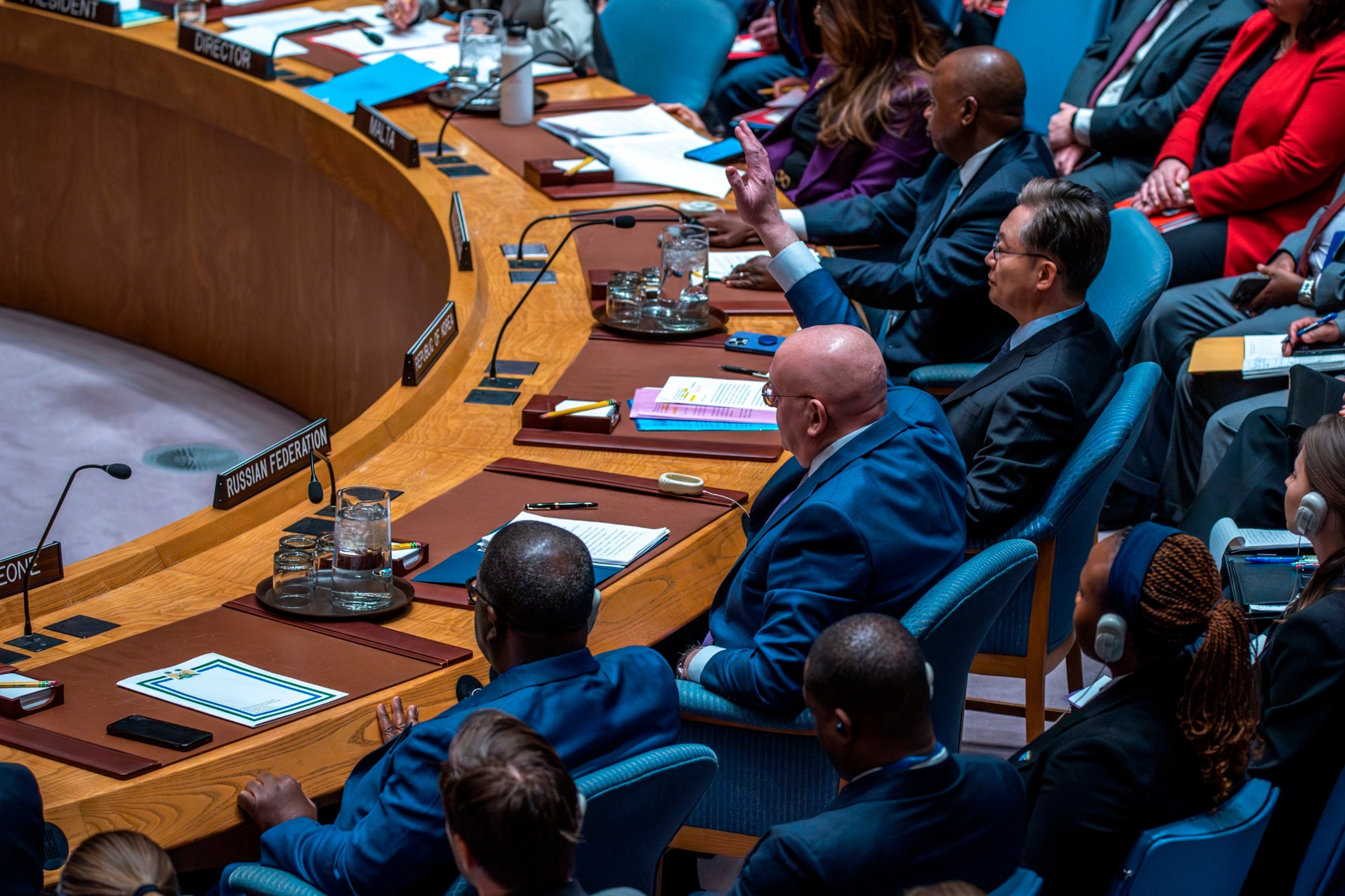 PHOTO: Russia's Ambassador to the United Nations Vasily Nebensya, center, votes against a U.S. ceasefire resolution for the Gaza war during a UN Security Council meeting at the United Nations headquarters, March 22, 2024, in New York.